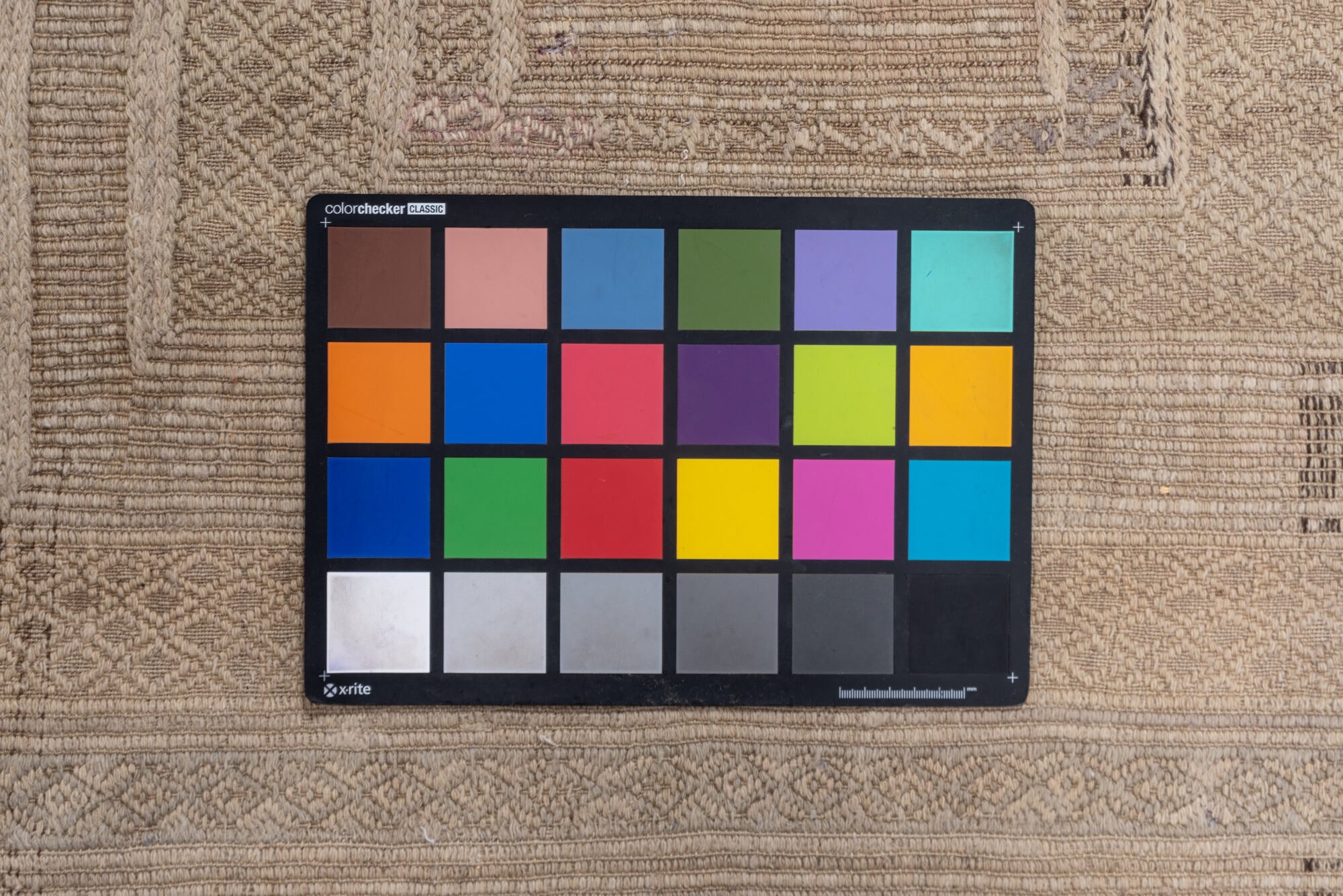 5' x 9' one-of-a-kind handmade vintage Jijim medium size rug. Color palette: gray, light gray, off-white, pink, snow, white