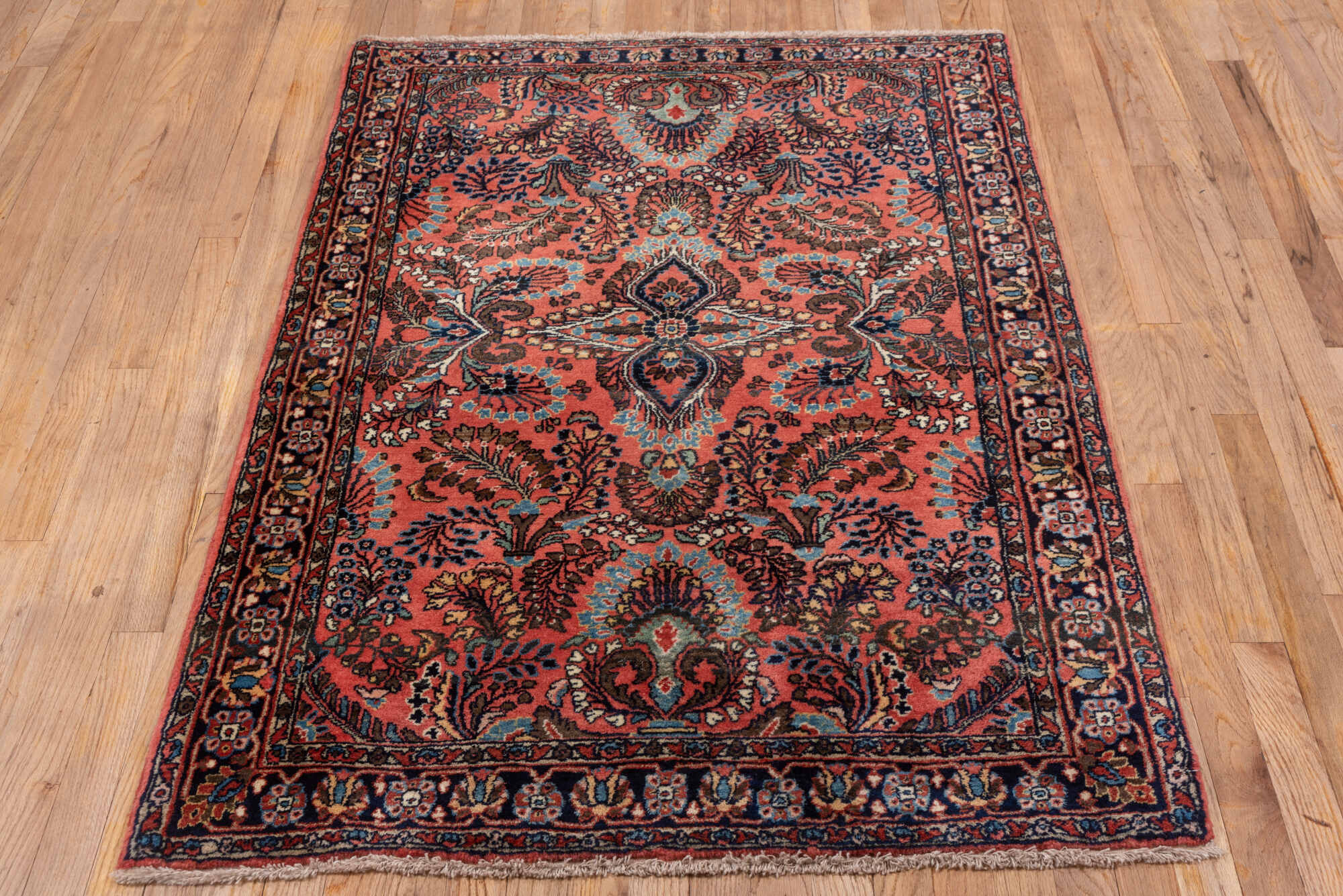 3' x 5' one-of-a-kind handmade vintage Sarouk small size rug. Color palette: black, blue, brown, gray, pink, red, redwood