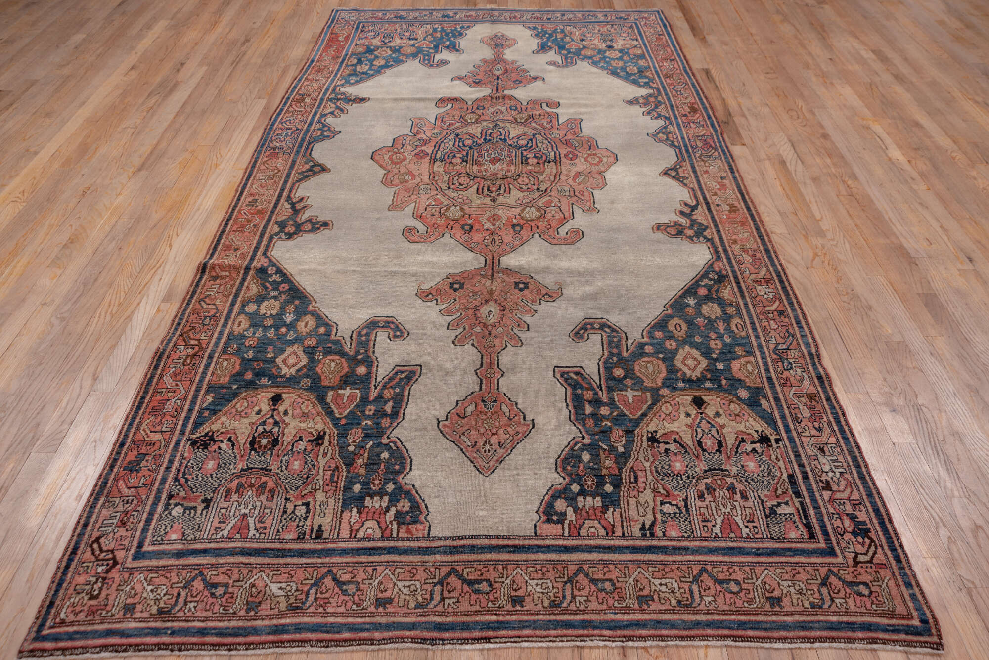 6' x 11' one-of-a-kind handmade vintage Malayer large size rug. Color palette: black, blue, brown, gray, pink, red, redwood