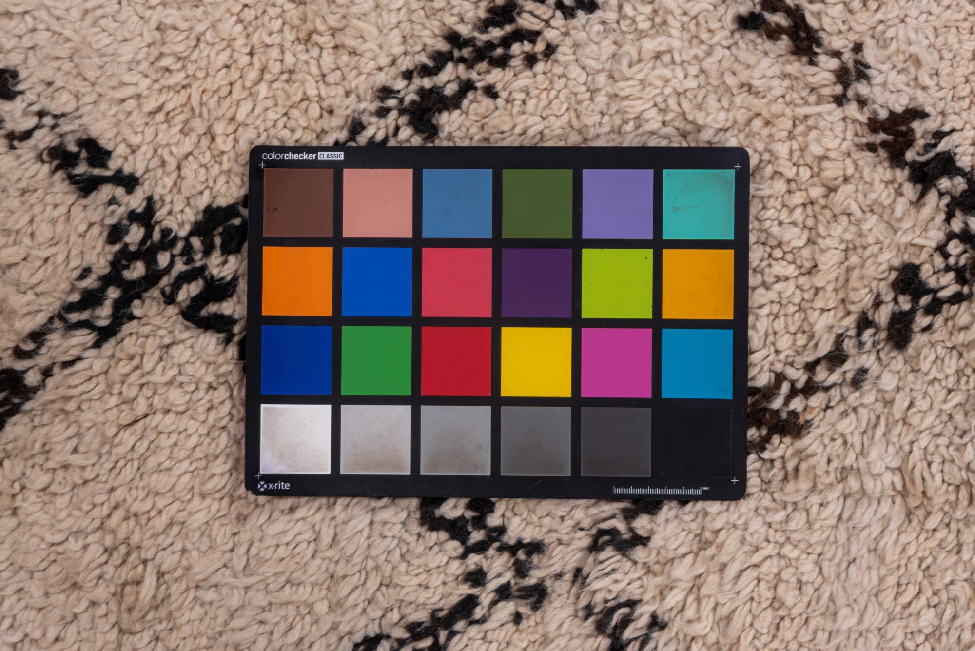 5' x 14' one-of-a-kind handmade vintage Moroccan rug. Color palette: brown, gray, light gray, off-white, pink