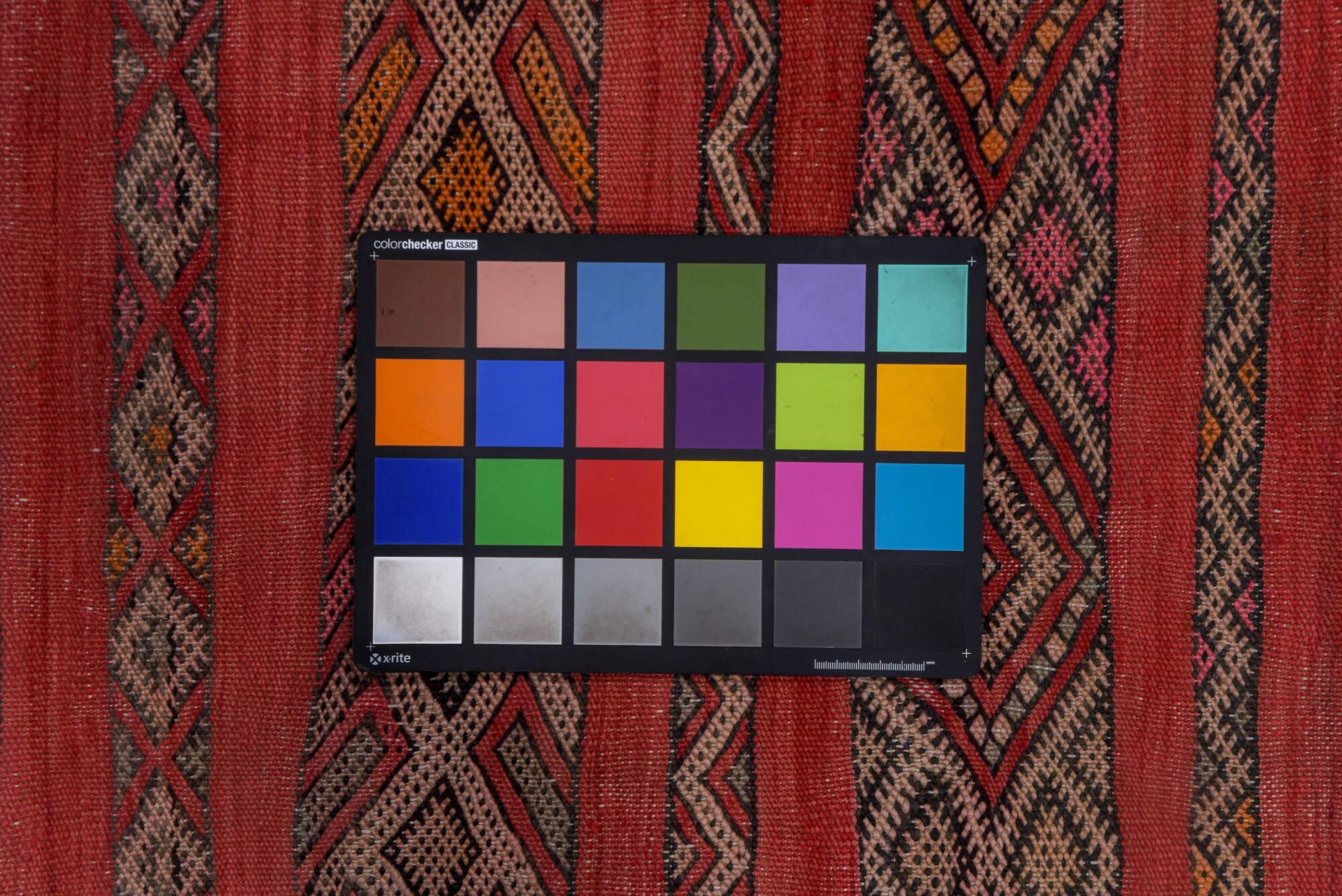 5' x 7' one-of-a-kind handmade vintage Kilim rug. Color palette: brown, gray, light gray, pink, red, redwood