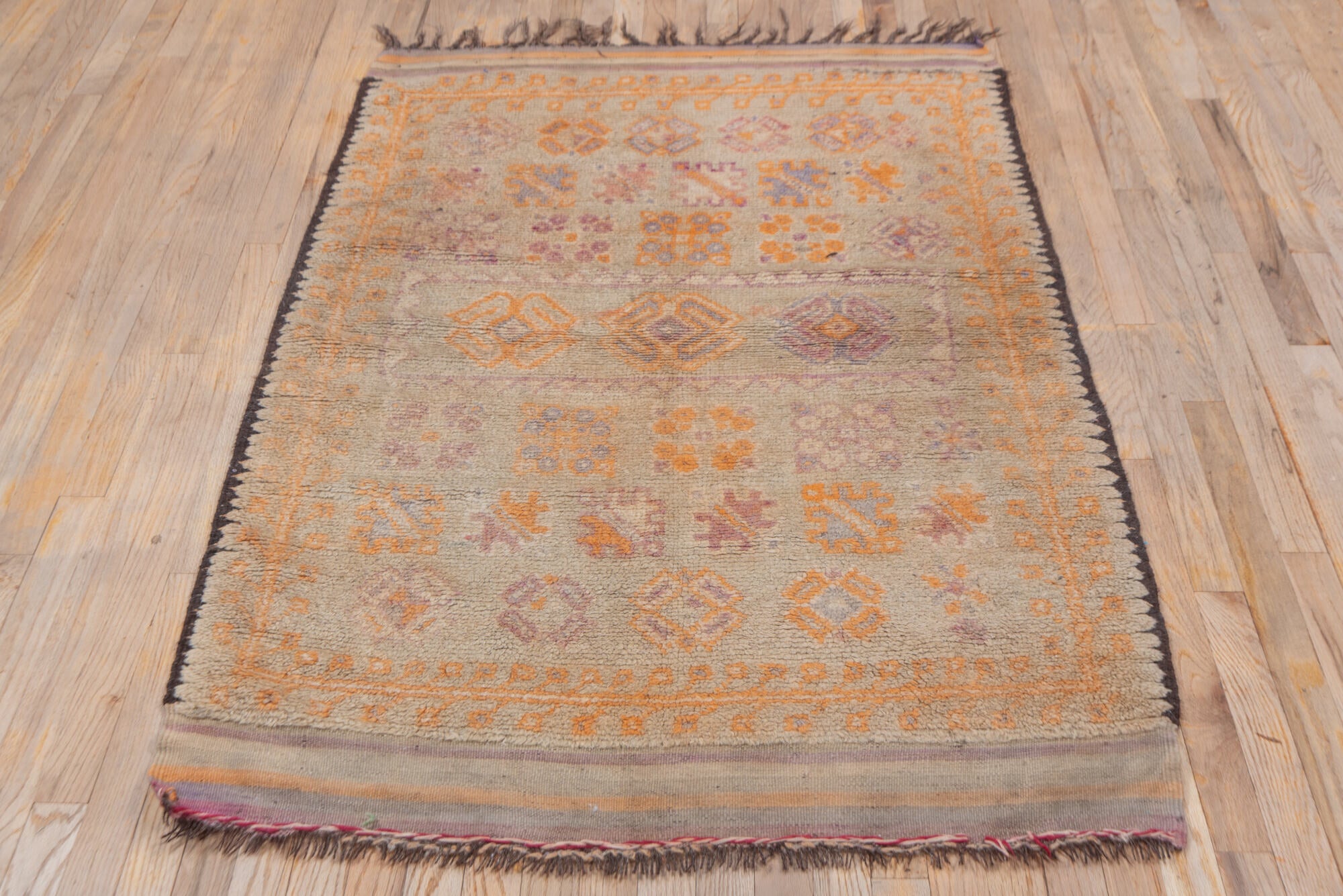3' x 5' one-of-a-kind handmade vintage Moroccan small size rug. Color palette: brown, gray, red, tan
