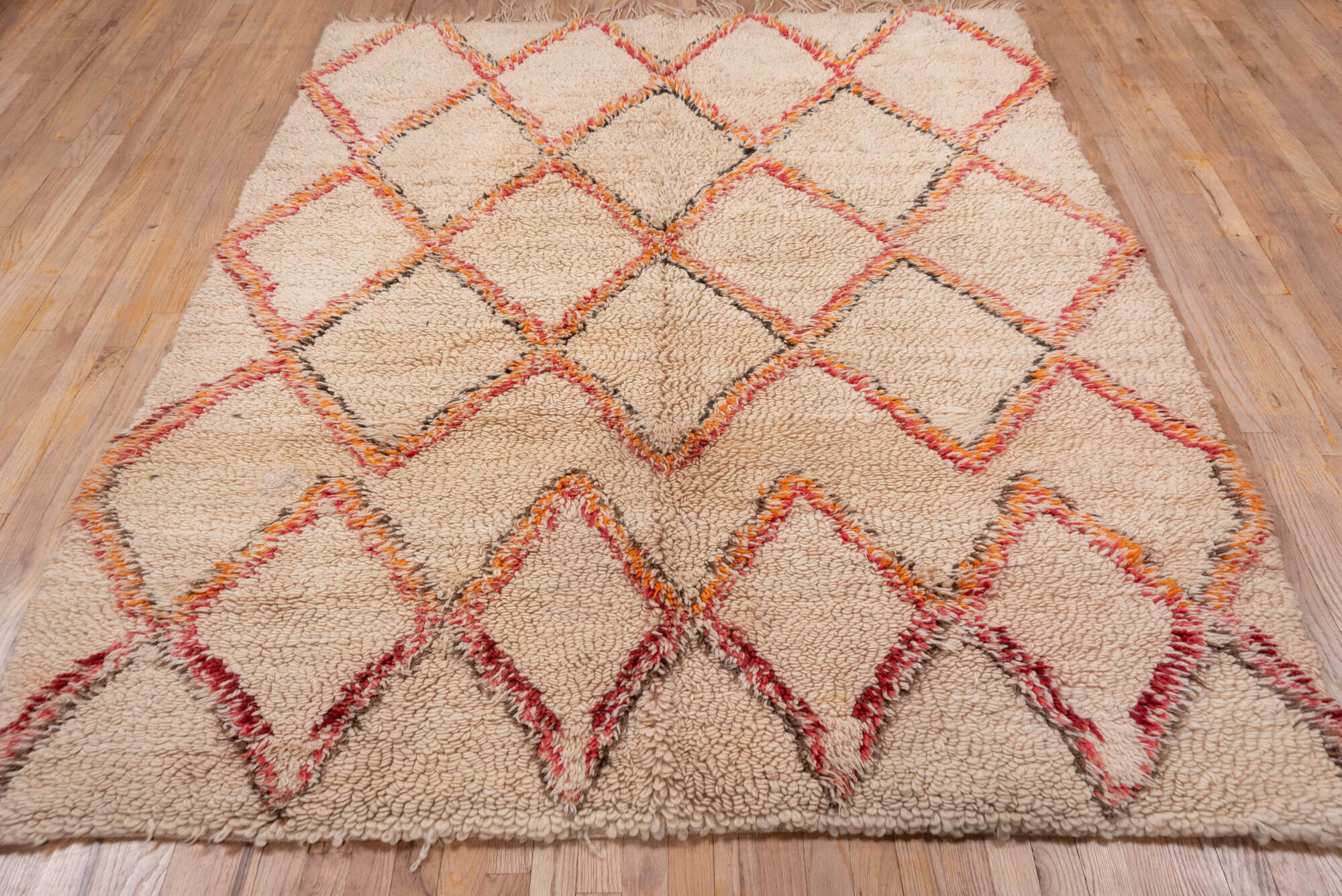 6' x 8' one-of-a-kind handmade vintage Moroccan medium size rug. Color palette: brown, gray, light gray, off-white, orange