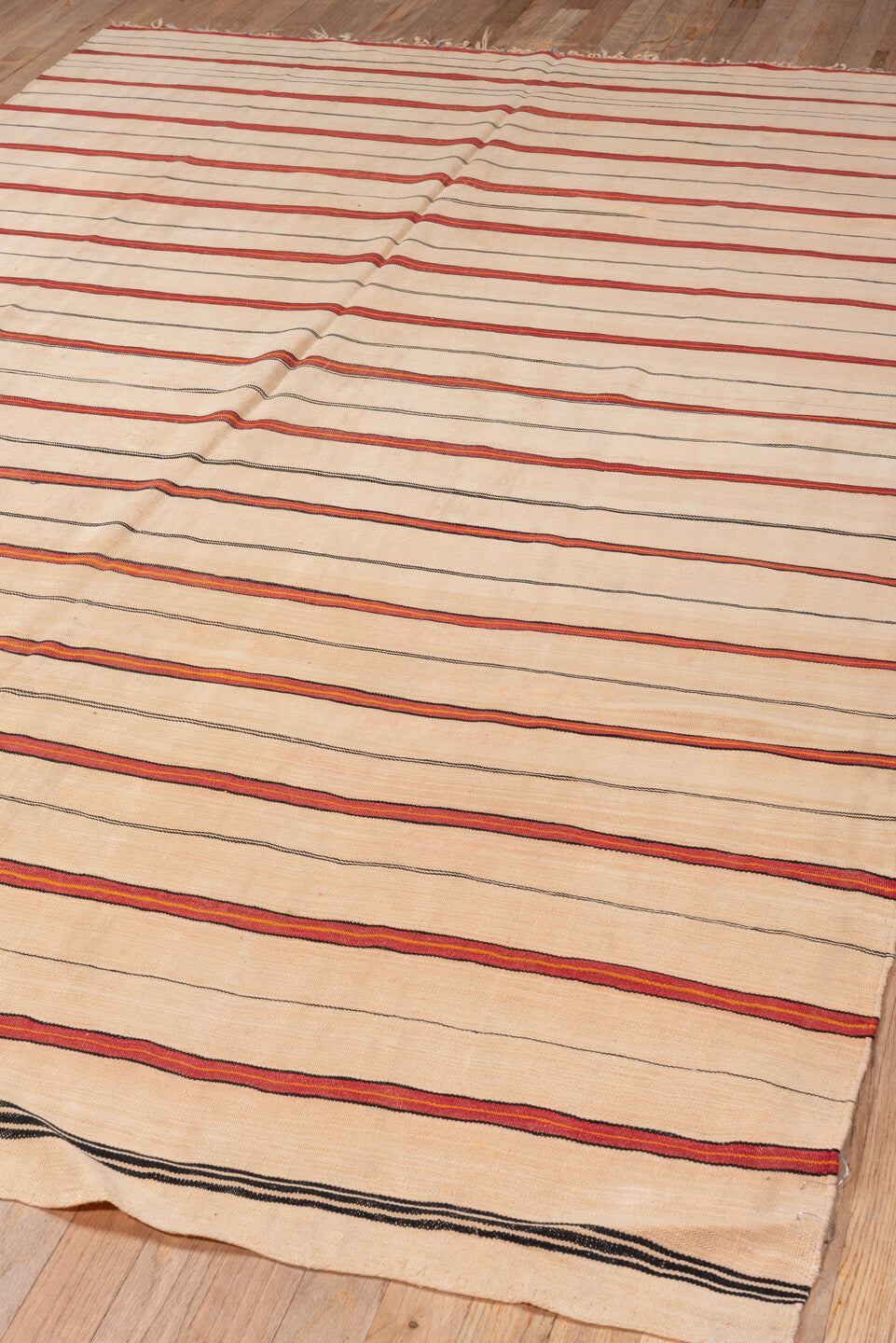 5' x 8' one-of-a-kind handmade vintage Kilim medium size rug. Color palette: orange, off-white, brown, red, pink, peach puff