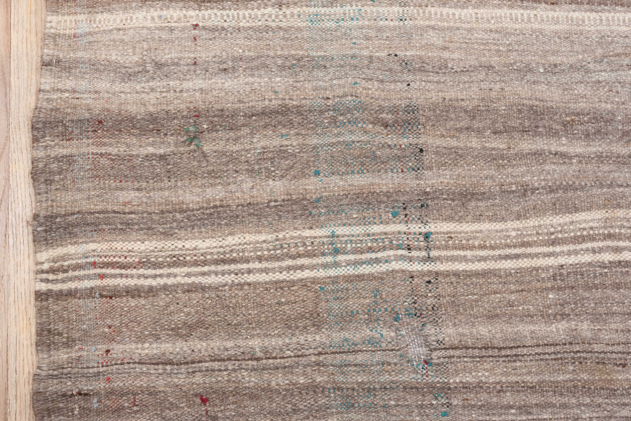 4' x 10' one-of-a-kind handmade vintage runner rug. Color palette: gray, brown, pink, light gray, off-white