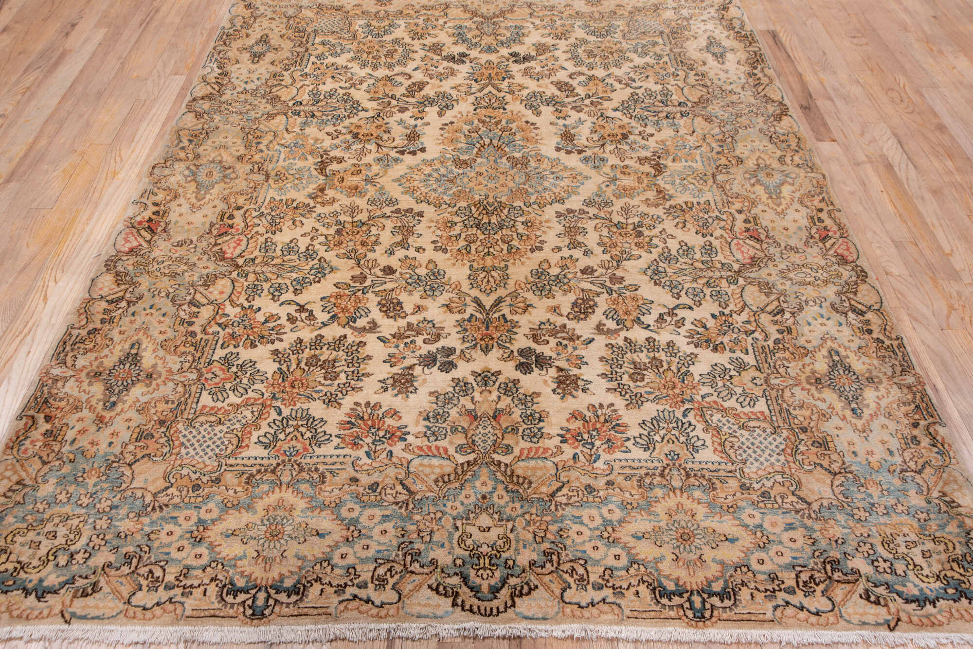 6' x 8' one-of-a-kind handmade vintage Kerman medium size rug. Color palette: brown, gray, pink, tan