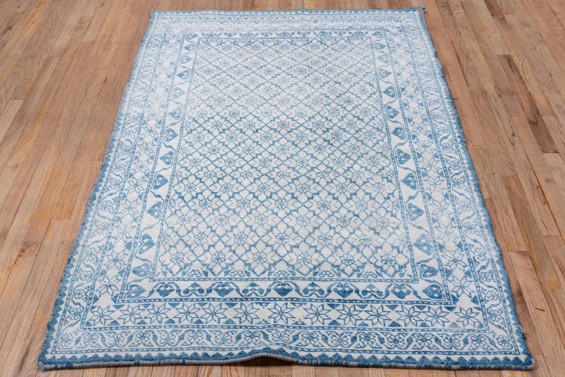 4' x 6' one-of-a-kind handmade vintage Agra small size rug. Color palette: light blue, gray, blue, light gray, off-white