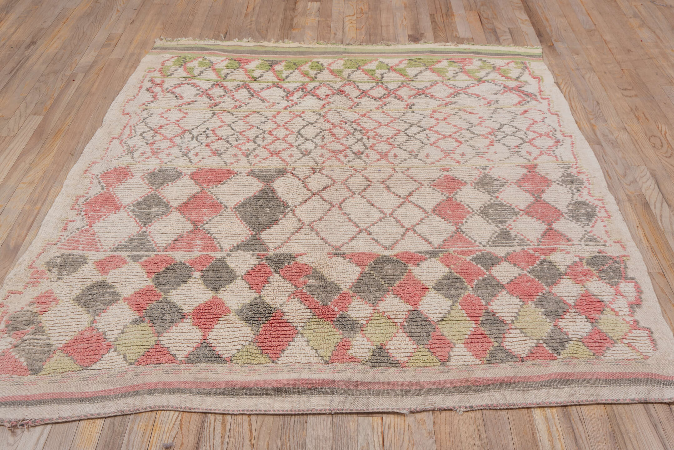 5' x 5' one-of-a-kind handmade vintage Moroccan rug. Color palette: brown, pink, gray, off-white, orange, red, tan