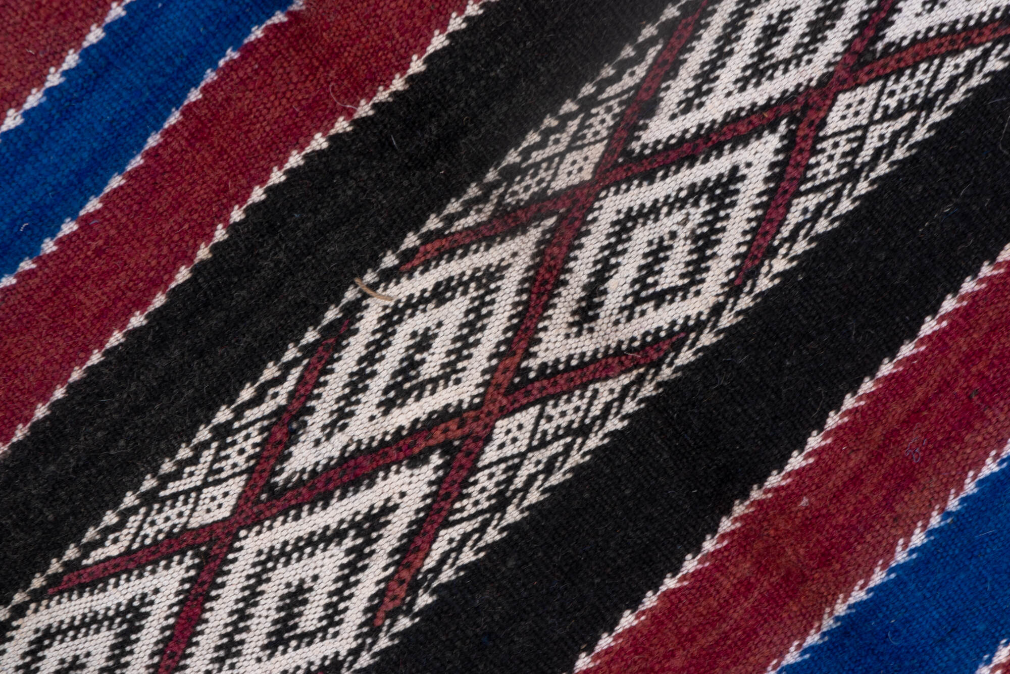 5' x 11' one-of-a-kind handmade vintage Kilim runner rug. Color palette: black, blue, brown, dark gray, gray, light gray