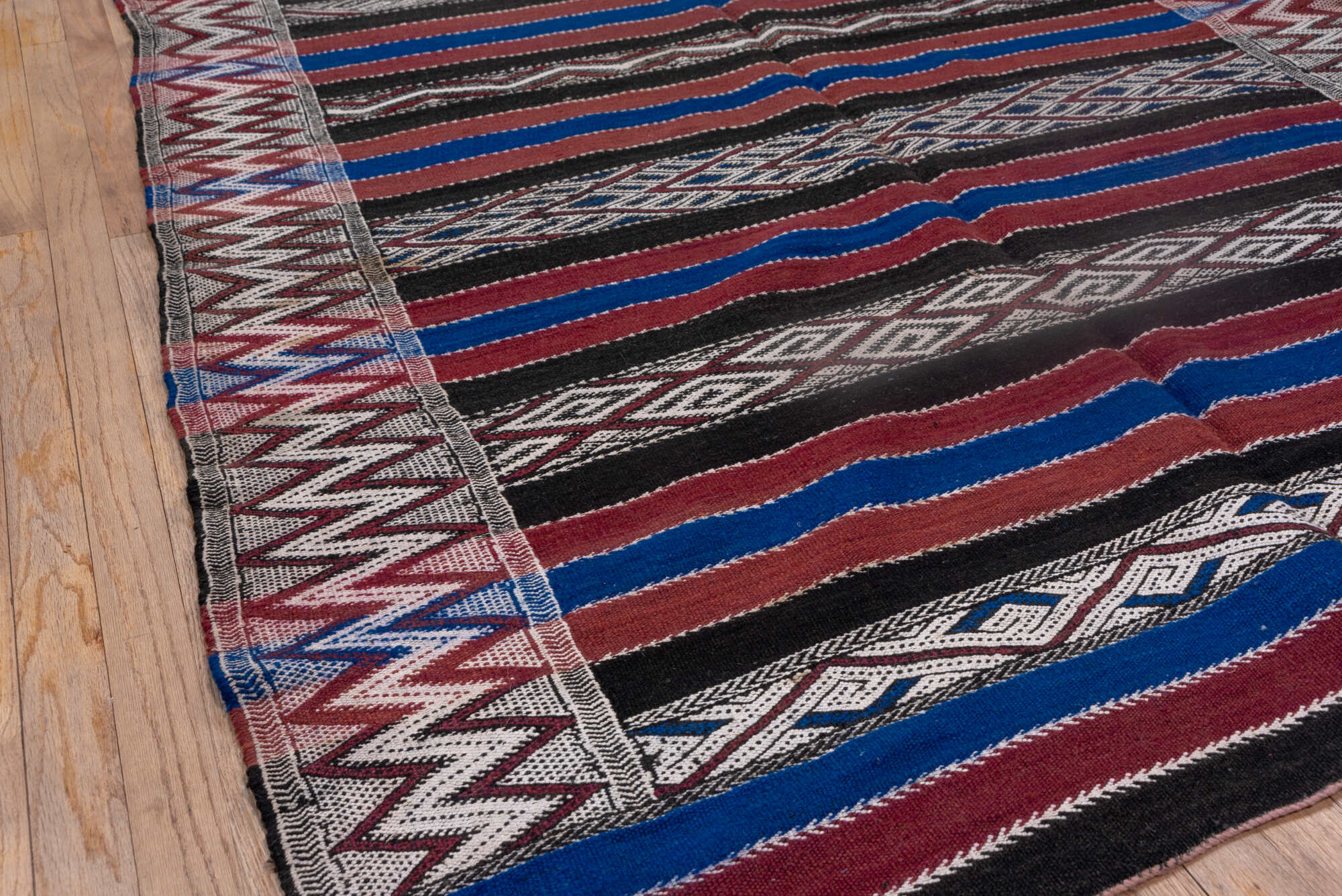 5' x 11' one-of-a-kind handmade vintage Kilim runner rug. Color palette: black, blue, brown, dark gray, gray, light gray