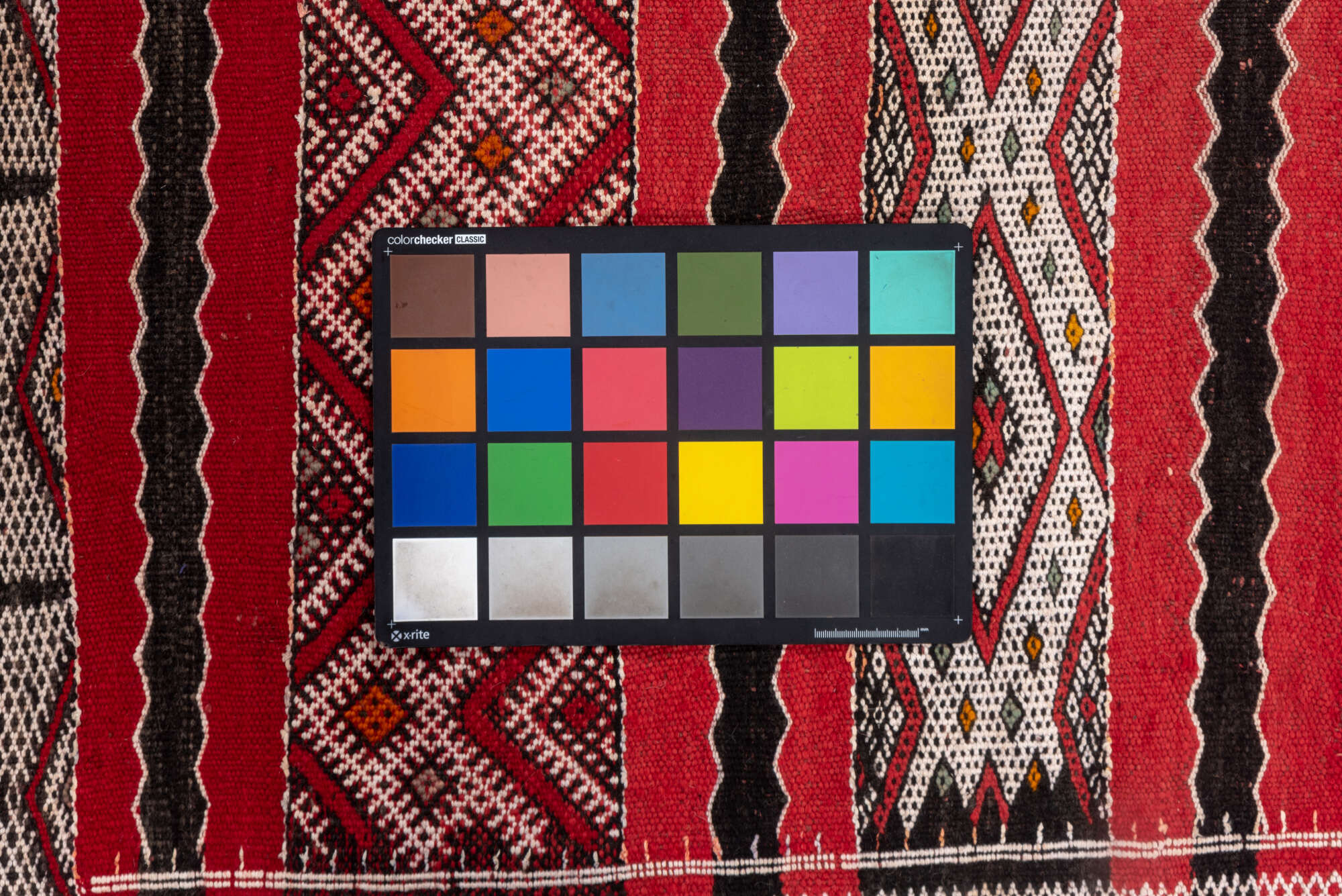 4' x 8' one-of-a-kind handmade vintage Kilim rug. Color palette: brown, gray, light gray, off-white, pink, red