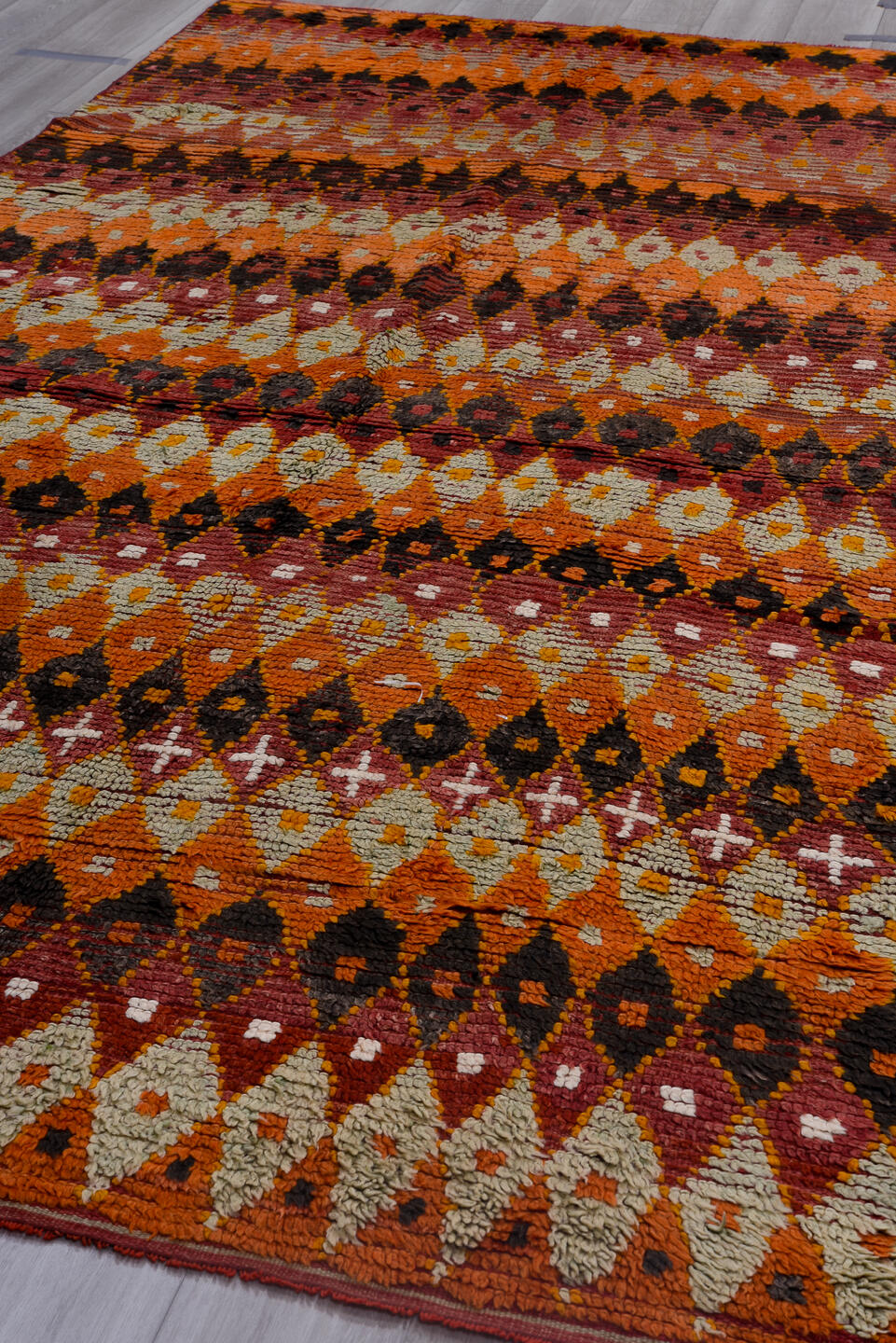 6' x 12' one-of-a-kind handmade vintage Moroccan large size rug. Color palette: pink, brown, gray, yellow, red, off-white