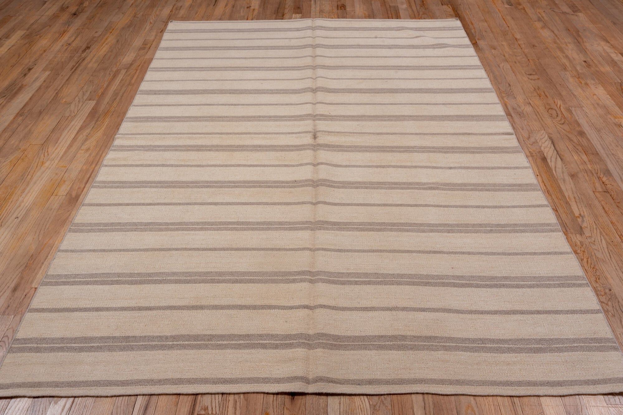 5' x 8' one-of-a-kind handmade vintage Kilim medium size rug. Color palette: brown, gray, light gray, off-white, orange