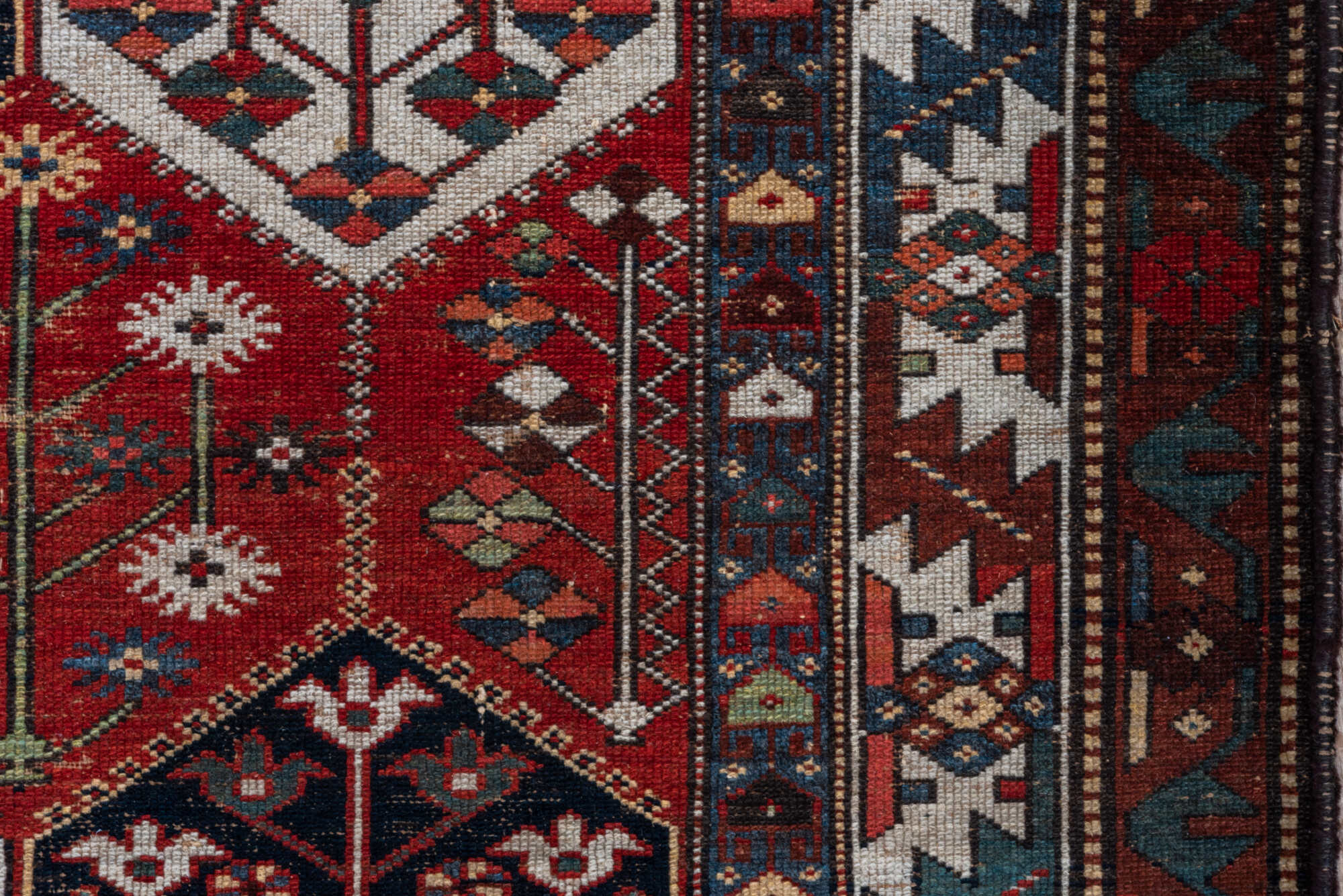 4' x 6' one-of-a-kind handmade vintage Baktiary small size rug. Color palette: gray, brown, light gray, black, blue, red