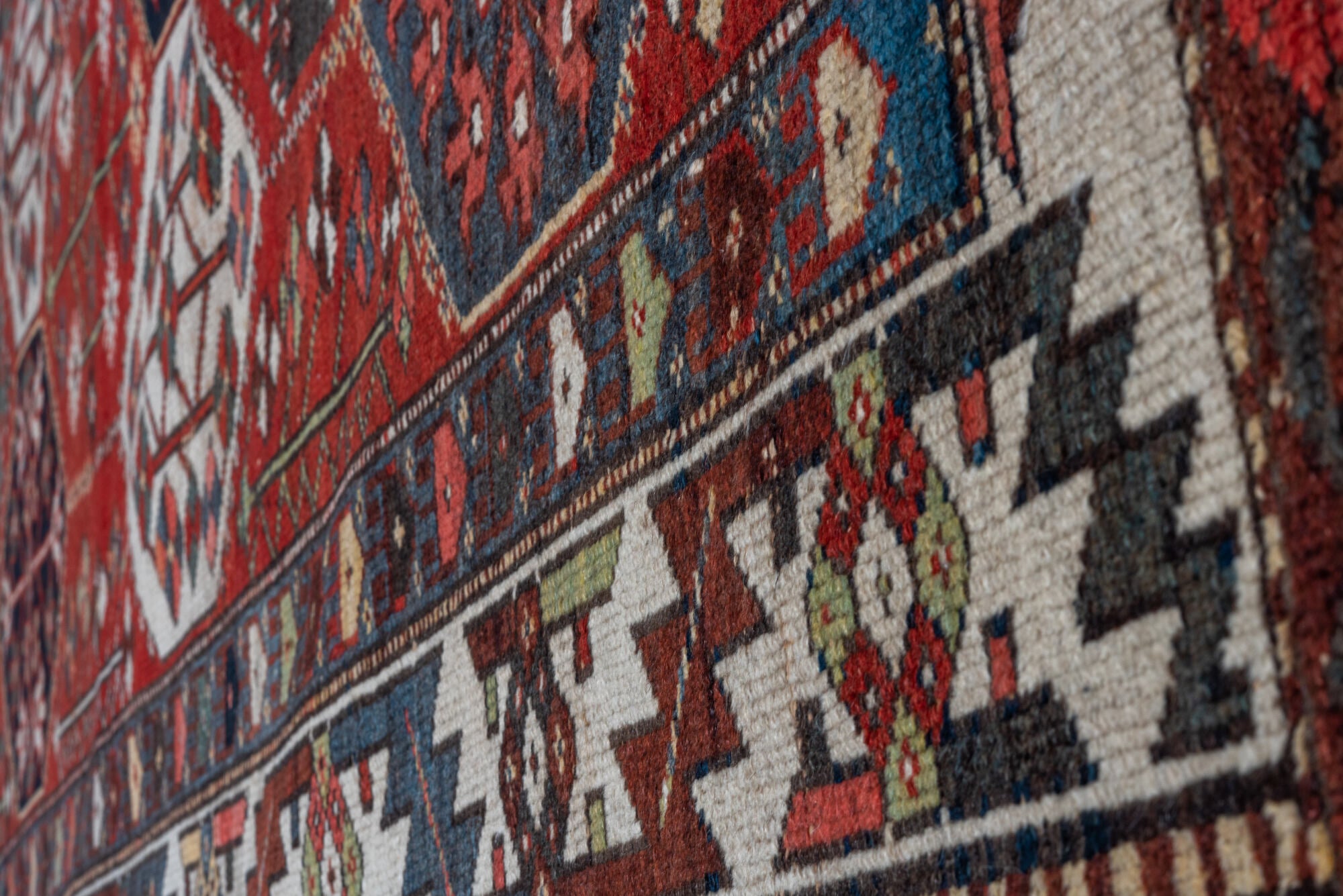 4' x 6' one-of-a-kind handmade vintage Baktiary small size rug. Color palette: gray, brown, light gray, black, blue, red