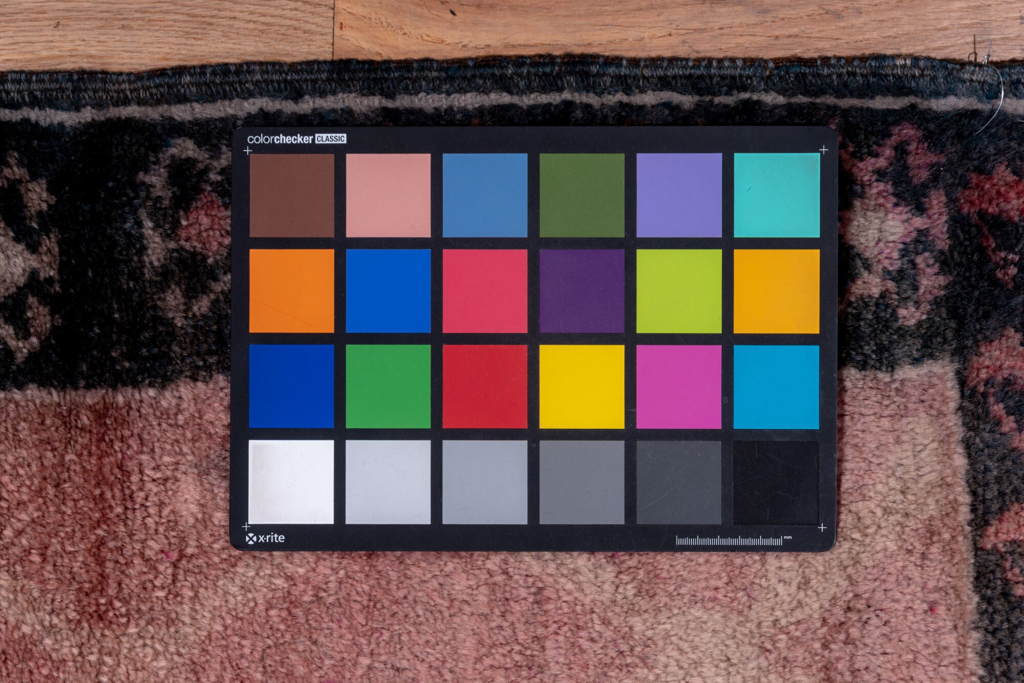 4' x 12' one-of-a-kind handmade vintage Kars runner rug. Color palette: black, blue, brown, gray, pink, red, redwood