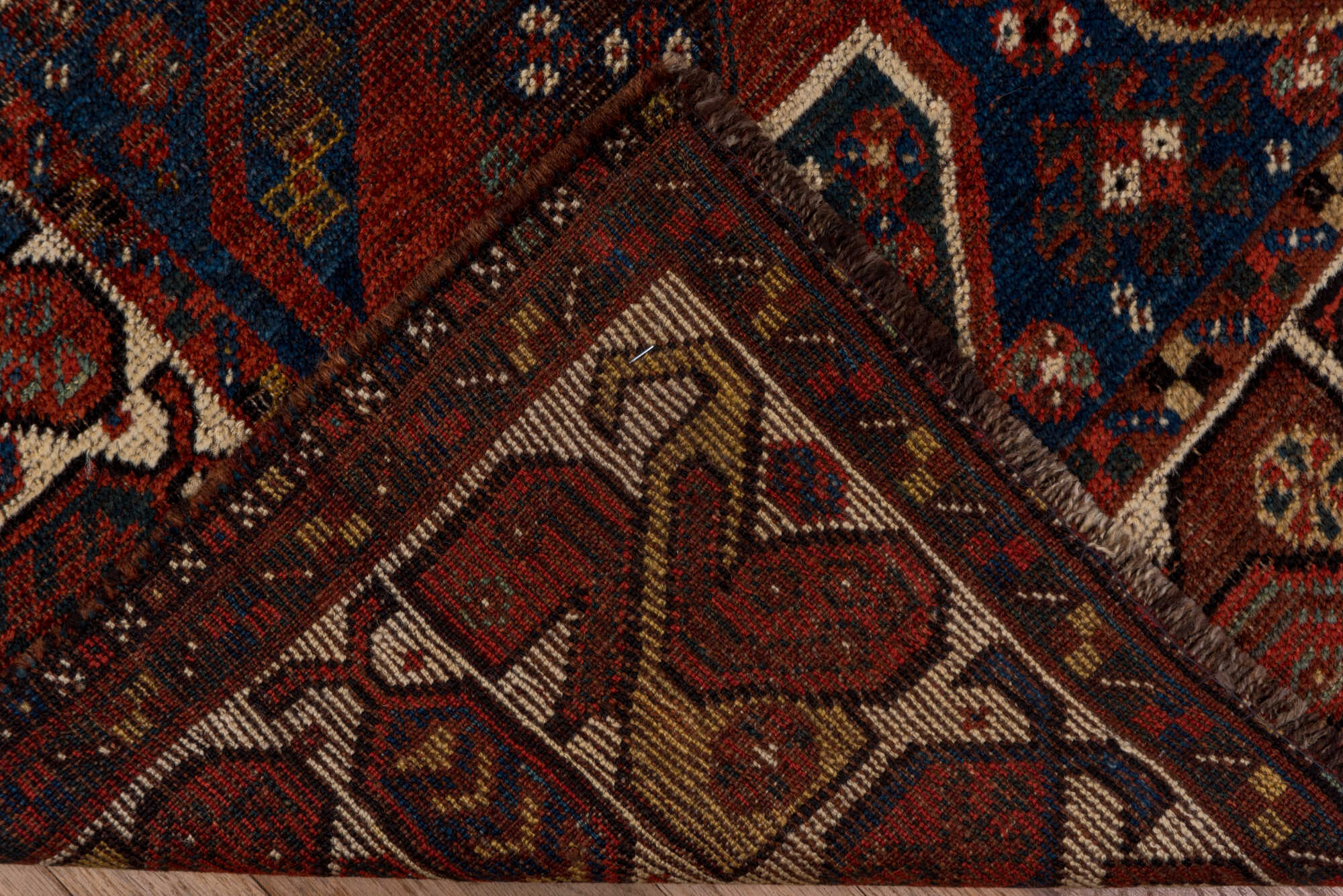 7' x 9' one-of-a-kind handmade vintage Shiraz rug. Color palette: gray, pink, brown, light gray, off-white, black, red, blue