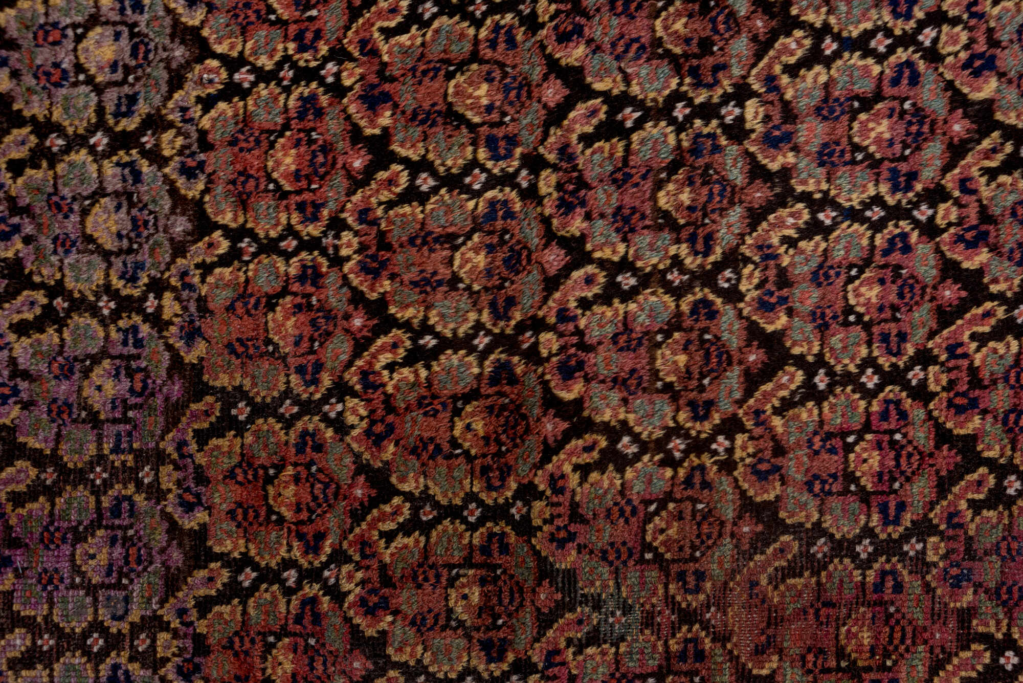 4' x 9' one-of-a-kind handmade vintage Kurd rug. Color palette: brown, dark gray, gray, light gray, off-white, pink, red