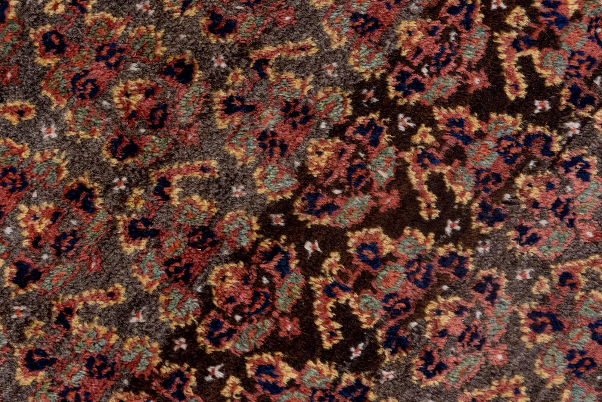 4' x 9' one-of-a-kind handmade vintage Kurd rug. Color palette: brown, dark gray, gray, light gray, off-white, pink, red