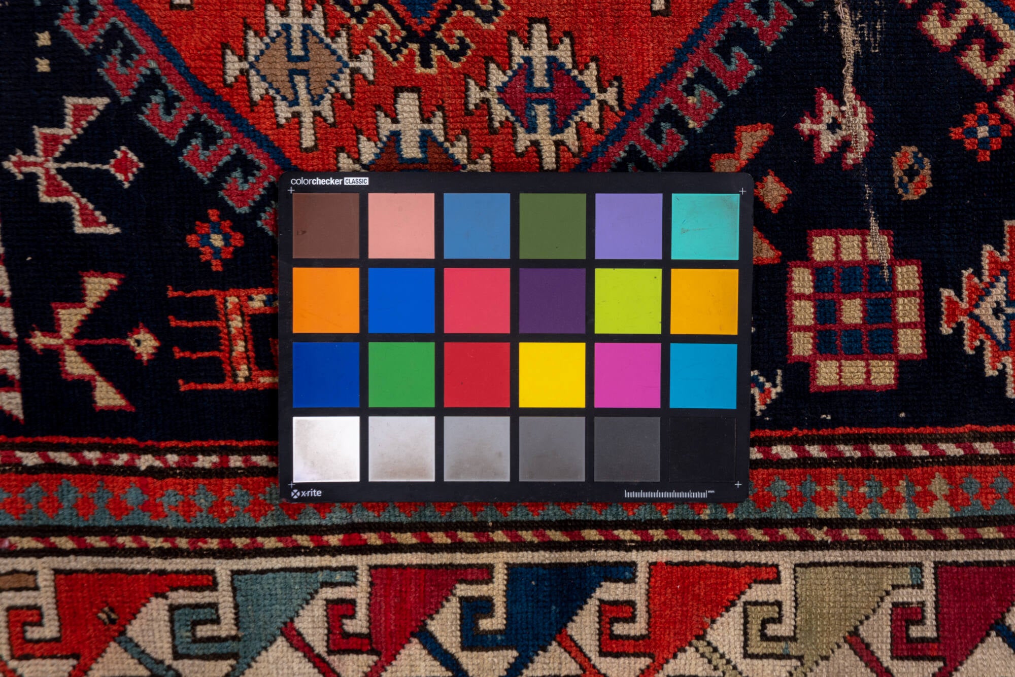 4' x 9' one-of-a-kind handmade vintage Shirvan runner rug. Color palette: blue, brown, gray, pink, red, redwood