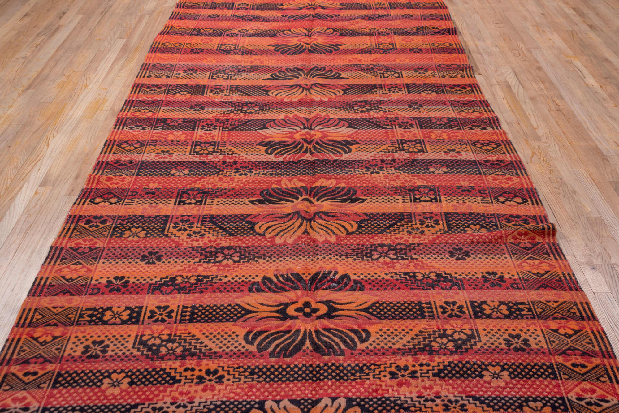 5' x 11' one-of-a-kind handmade vintage Kilim rug. Color palette: black, brown, gray, pink, red, wine