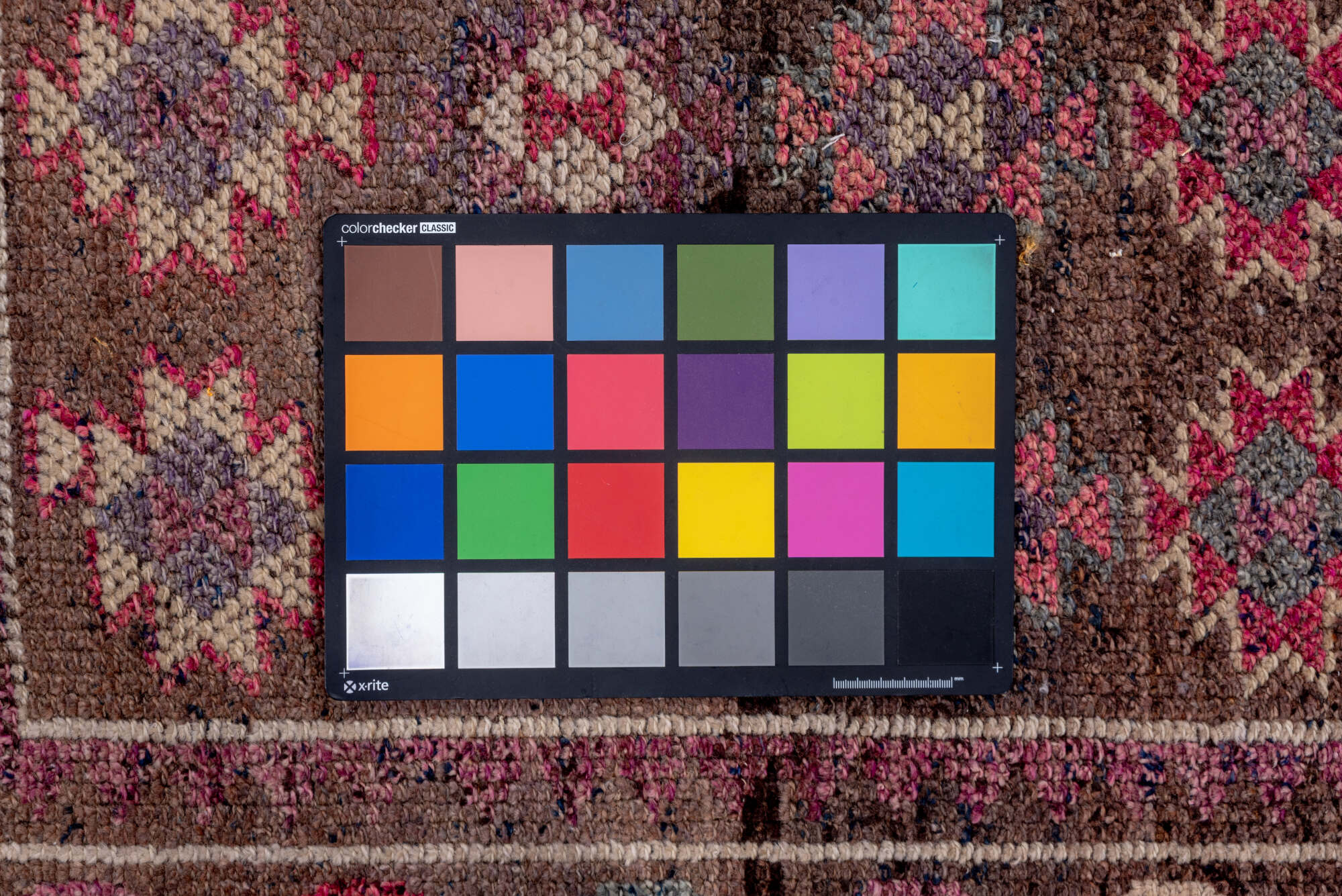 3' x 12' one-of-a-kind handmade vintage Kars runner rug. Color palette: brown, gray, light gray, pink, red