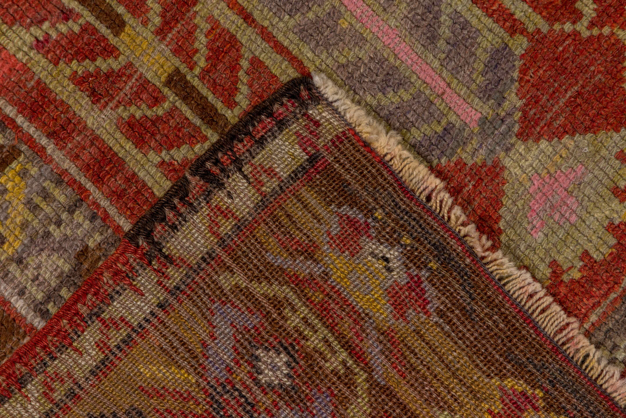 2' x 4' one-of-a-kind handmade vintage Oushak small size rug. Color palette: brown, gray, pink, red, yellow, off-white