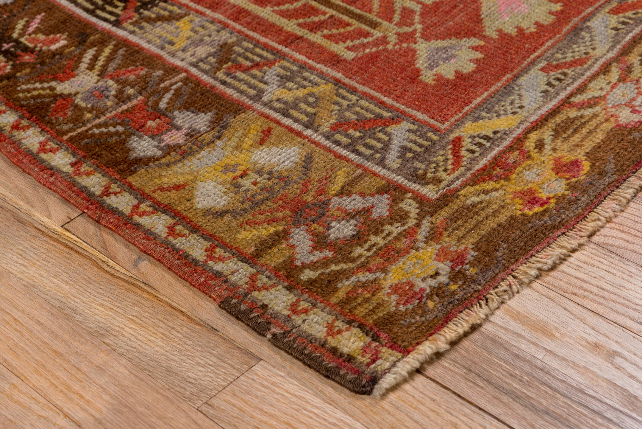 2' x 4' one-of-a-kind handmade vintage Oushak small size rug. Color palette: brown, gray, pink, red, yellow, off-white