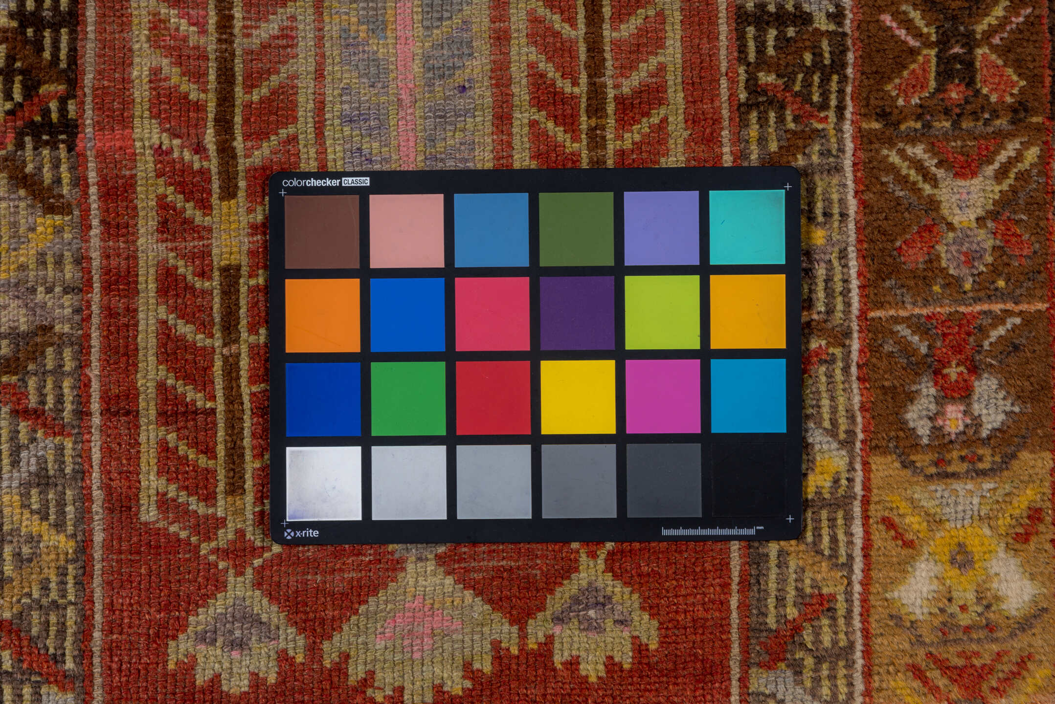 2' x 4' one-of-a-kind handmade vintage Oushak small size rug. Color palette: brown, gray, pink, red, yellow, off-white