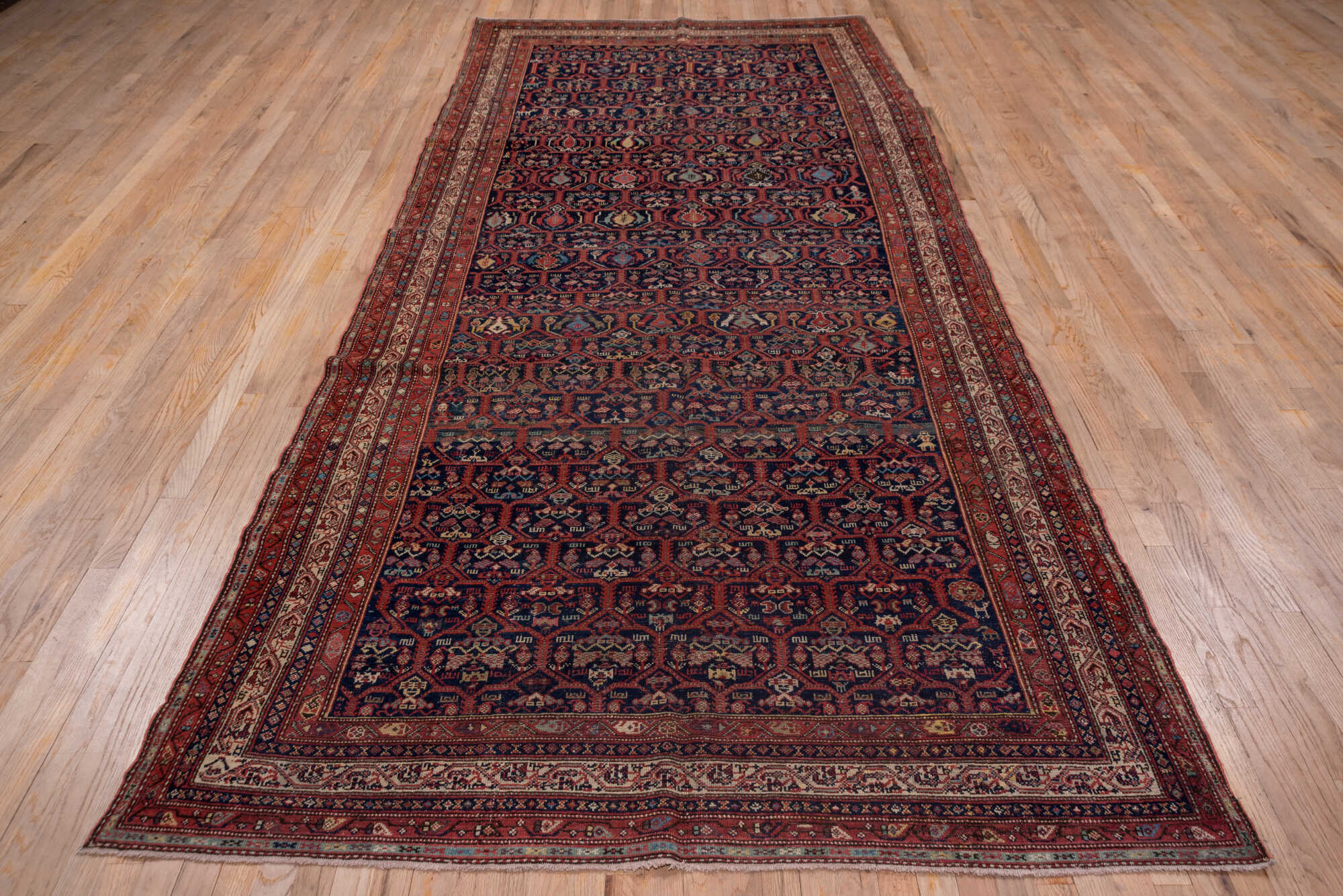 5' x 12' one-of-a-kind handmade vintage Malayer rug. Color palette: blue, brown, gray, pink, red, redwood