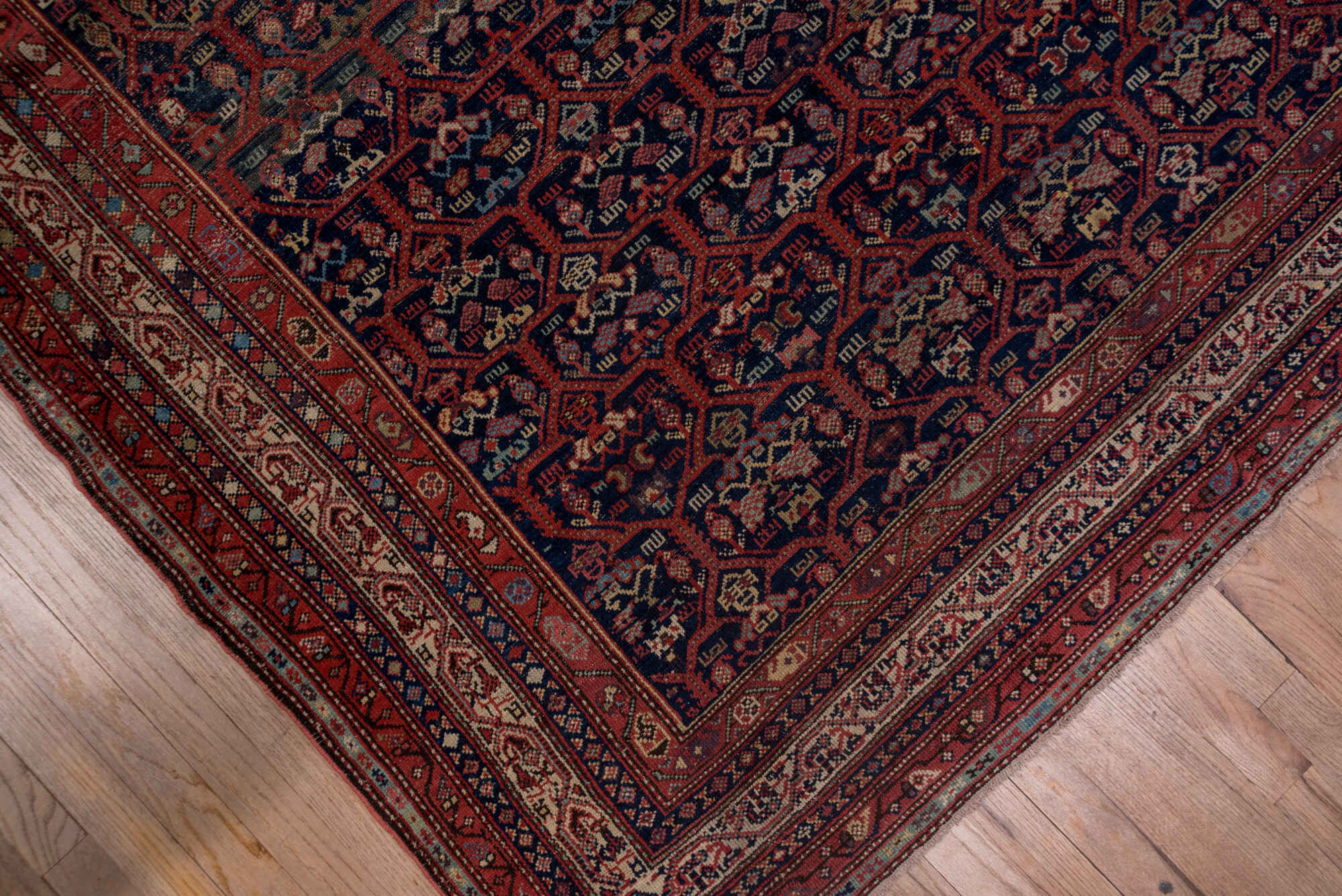 5' x 12' one-of-a-kind handmade vintage Malayer rug. Color palette: blue, brown, gray, pink, red, redwood