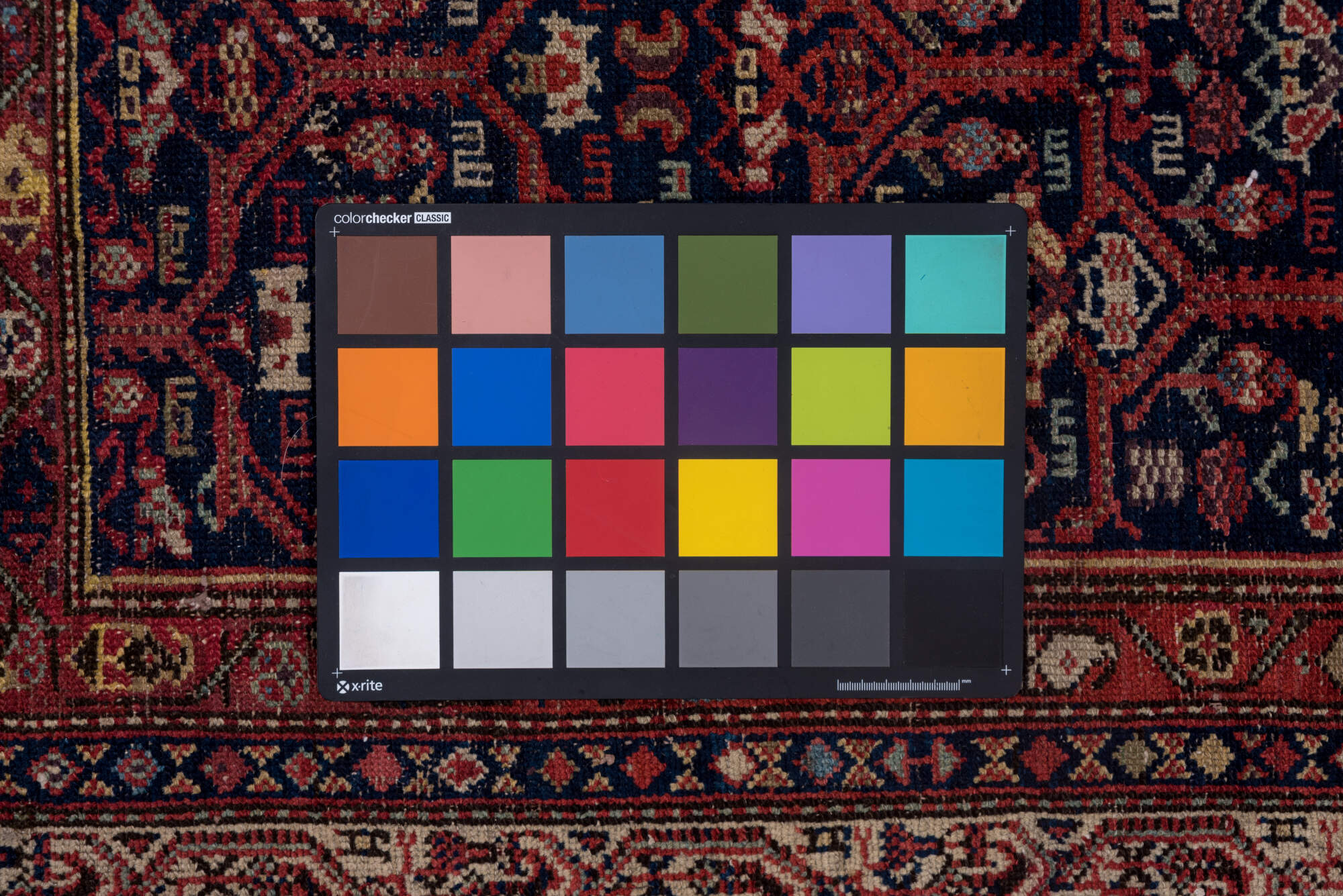 5' x 12' one-of-a-kind handmade vintage Malayer rug. Color palette: blue, brown, gray, pink, red, redwood