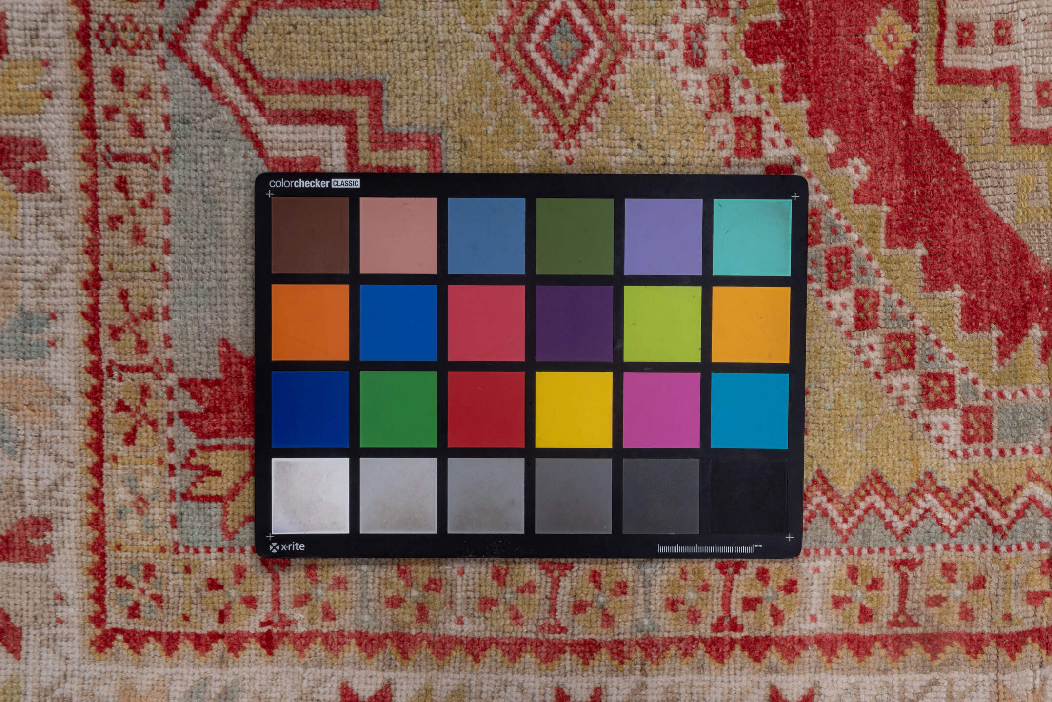 3' x 5' one-of-a-kind handmade vintage Oushak small size rug. Color palette: gray, off-white, light gray, pink, brown, red