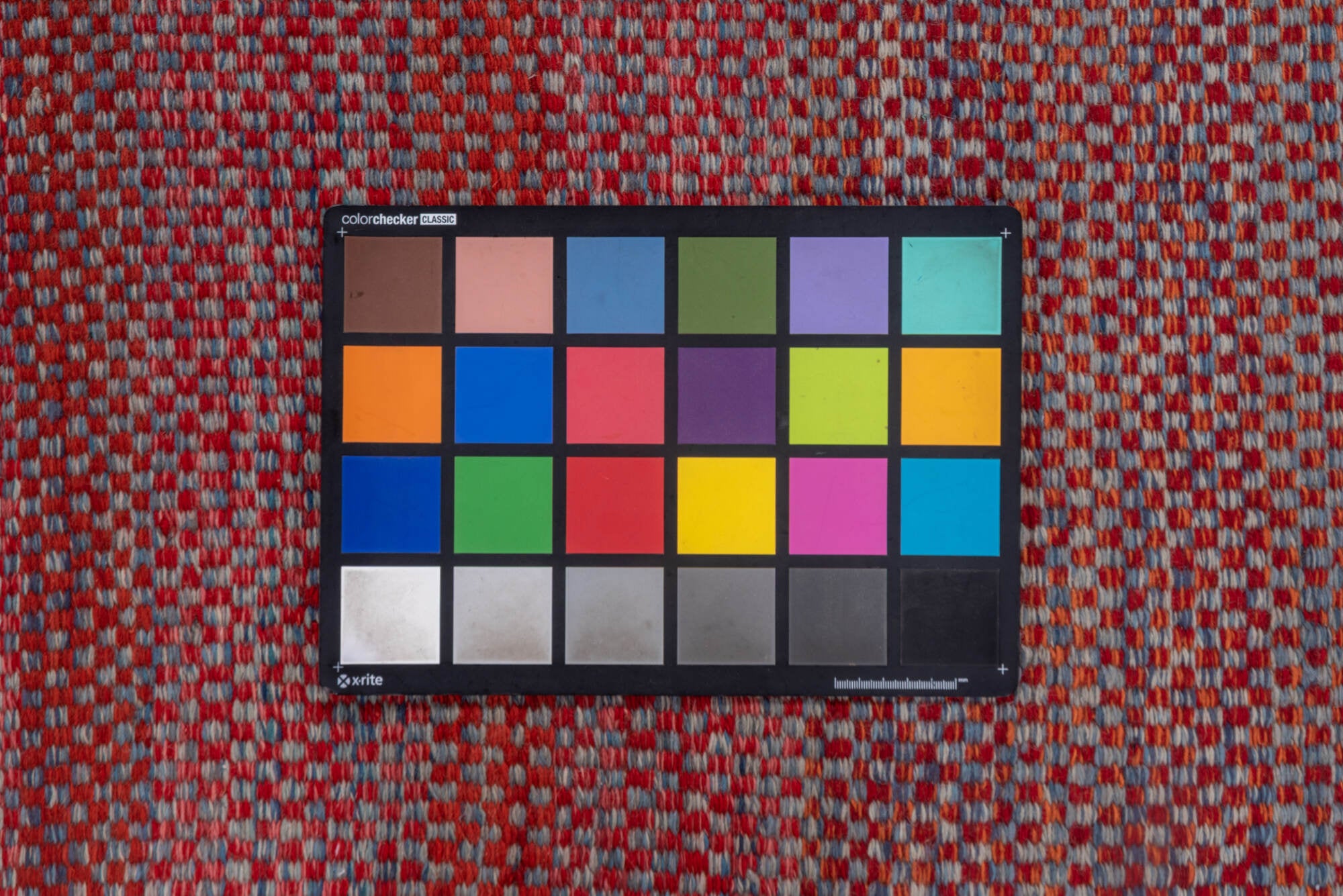 2' x 5' one-of-a-kind handmade vintage Kilim small size rug. Color palette: brown, gray, off-white, pink, red, redwood, snow