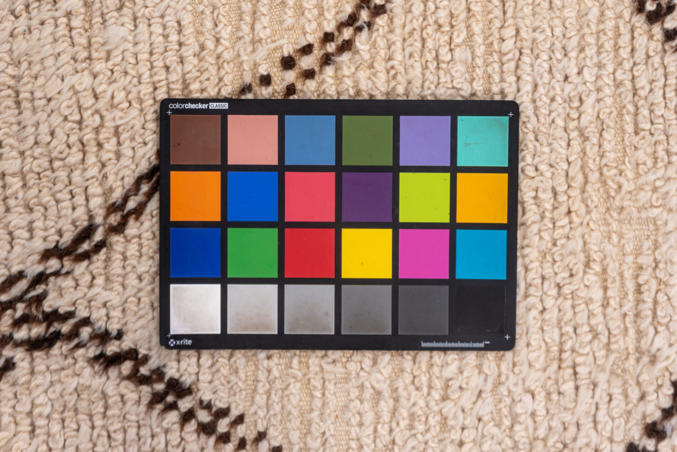 5' x 9' one-of-a-kind handmade vintage Moroccan medium size rug. Color palette: black, brown, gainsboro, gray, light gray