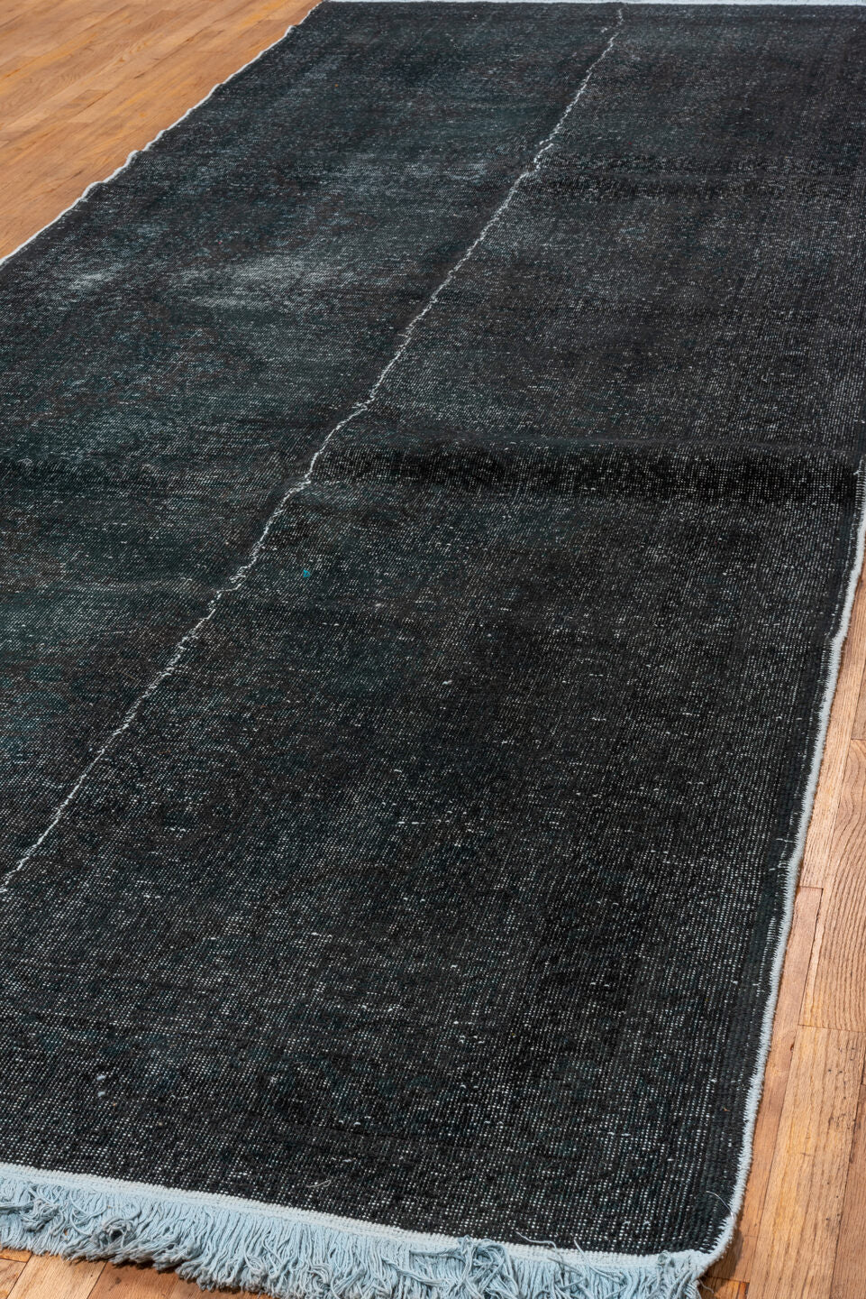 4' x 11' one-of-a-kind handmade vintage Overdyed runner rug. Color palette: gray, blue, light gray, off-white, black