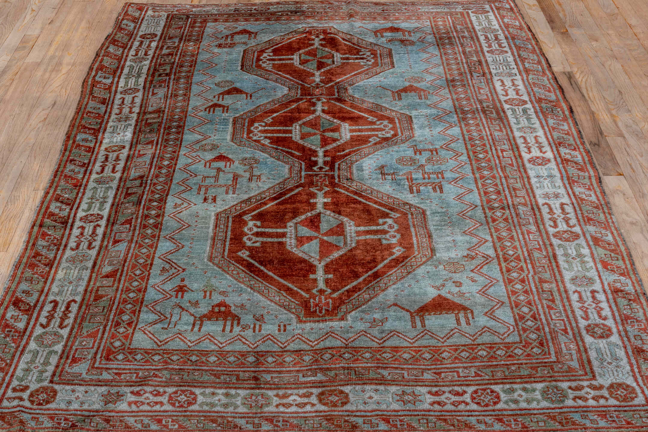 4' x 7' one-of-a-kind handmade vintage Caucasian rug. Color palette: gray, pink, brown, light gray