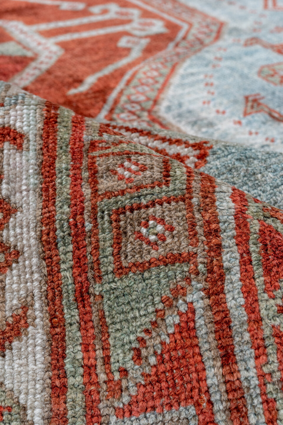 4' x 7' one-of-a-kind handmade vintage Caucasian rug. Color palette: gray, pink, brown, light gray