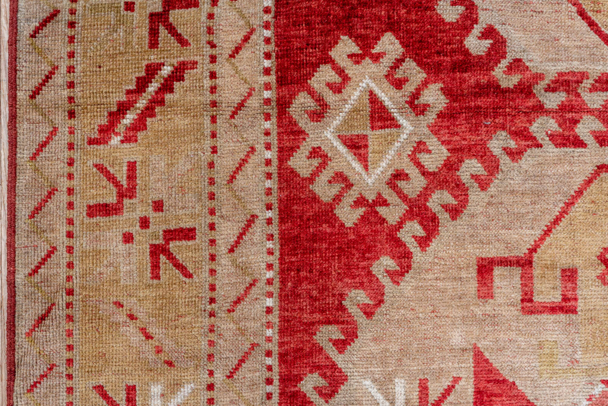 4' x 7' one-of-a-kind handmade vintage Caucasian rug. Color palette: brown, gray, light gray, off-white, pink, red