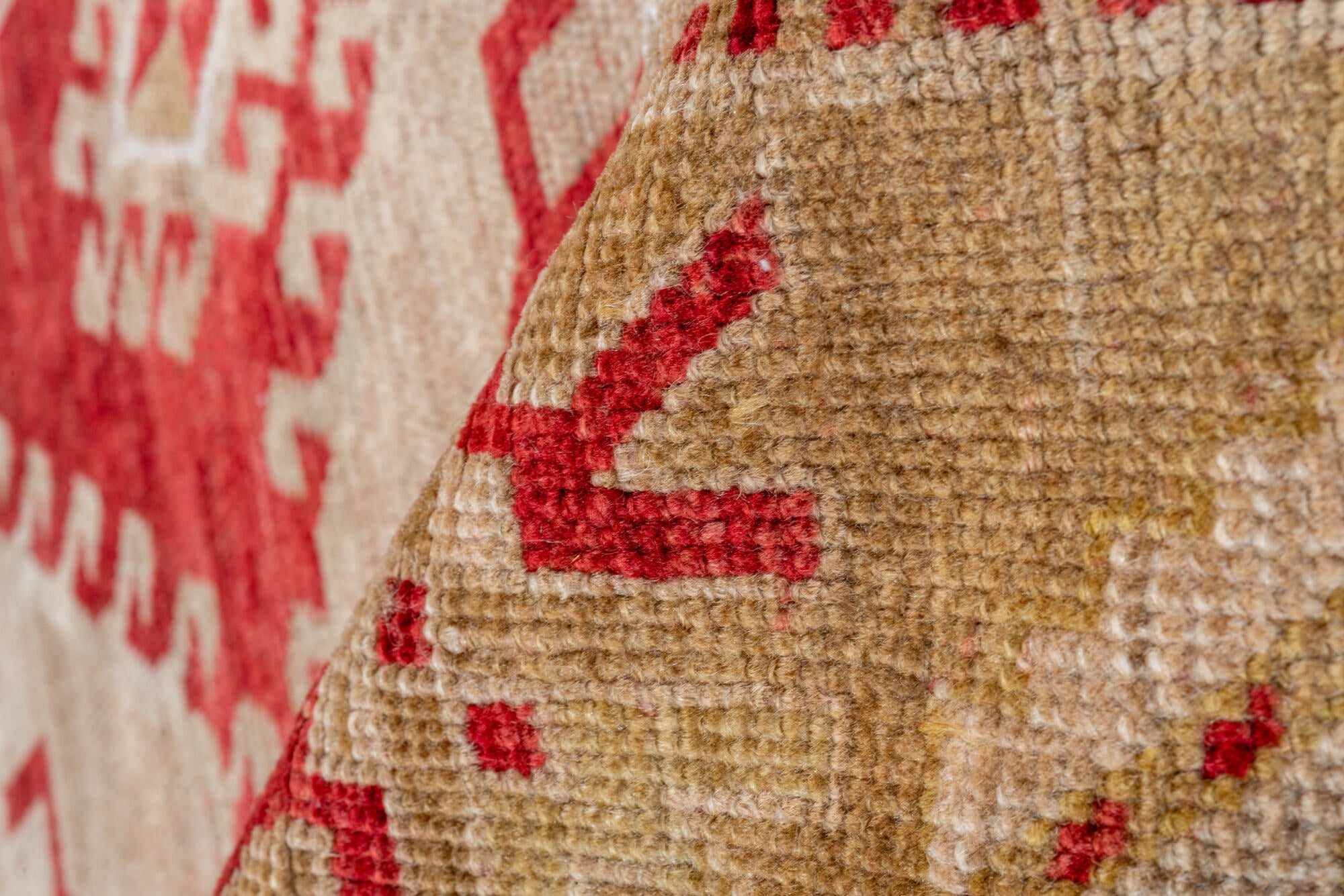 4' x 7' one-of-a-kind handmade vintage Caucasian rug. Color palette: brown, gray, light gray, off-white, pink, red