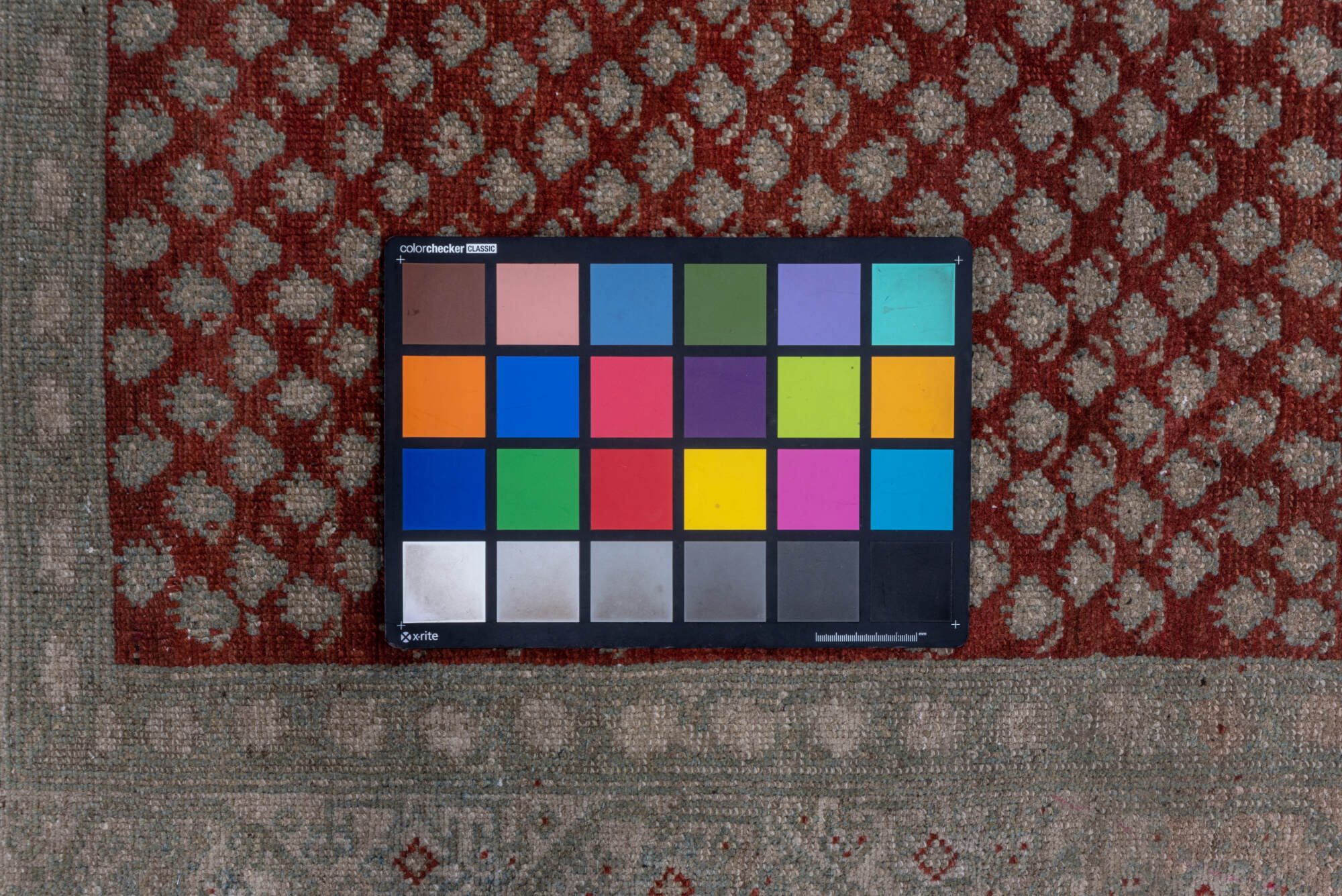 3' x 10' one-of-a-kind handmade vintage Saraband runner rug. Color palette: brown, gray, off-white, red, redwood, snow