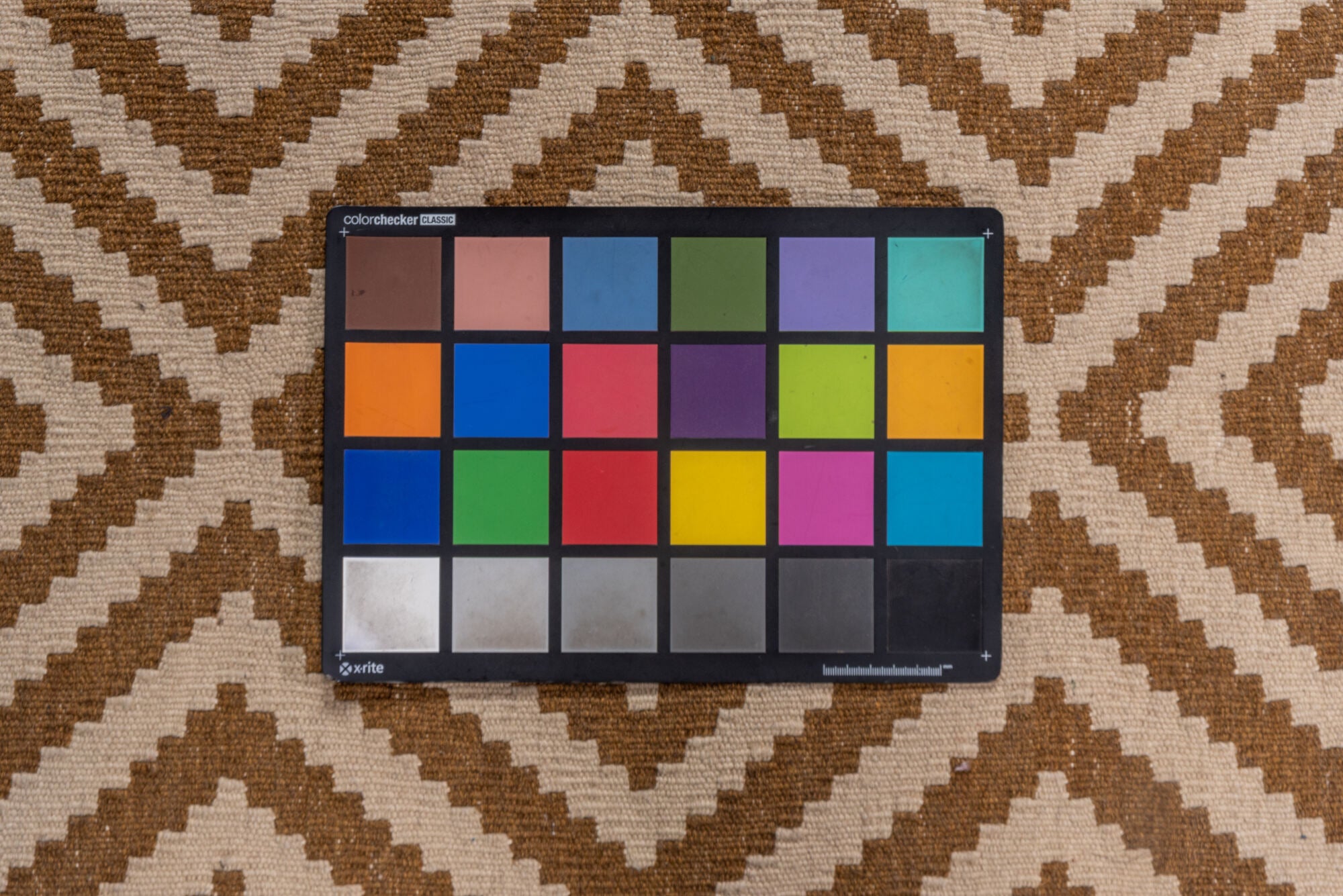 3' x 5' one-of-a-kind handmade vintage Kilim small size rug. Color palette: brown, gray, light gray, off-white, pink, snow