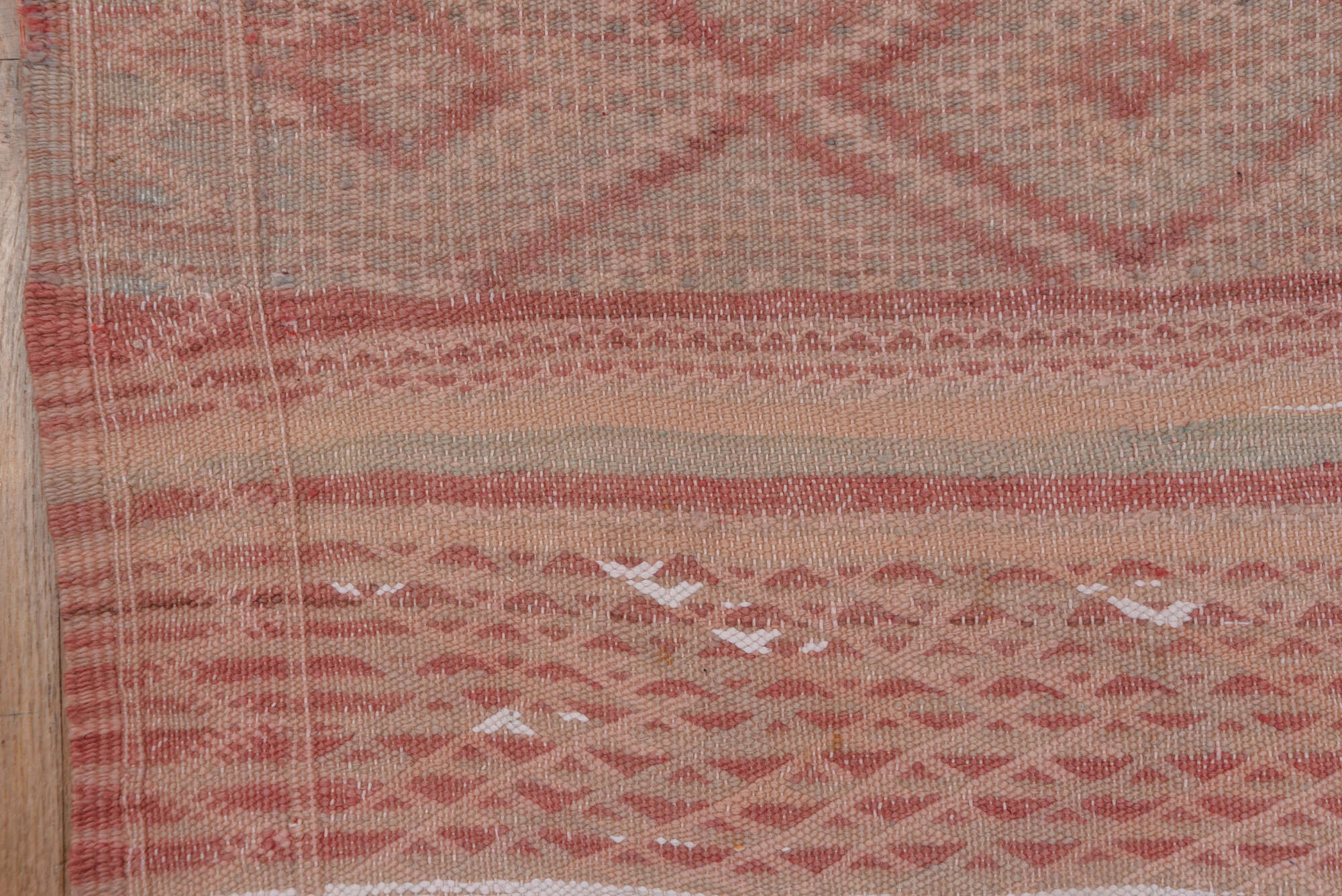 4' x 10' one-of-a-kind handmade vintage Moroccan runner rug. Color palette: brown, gray, light gray, off-white, pink, red
