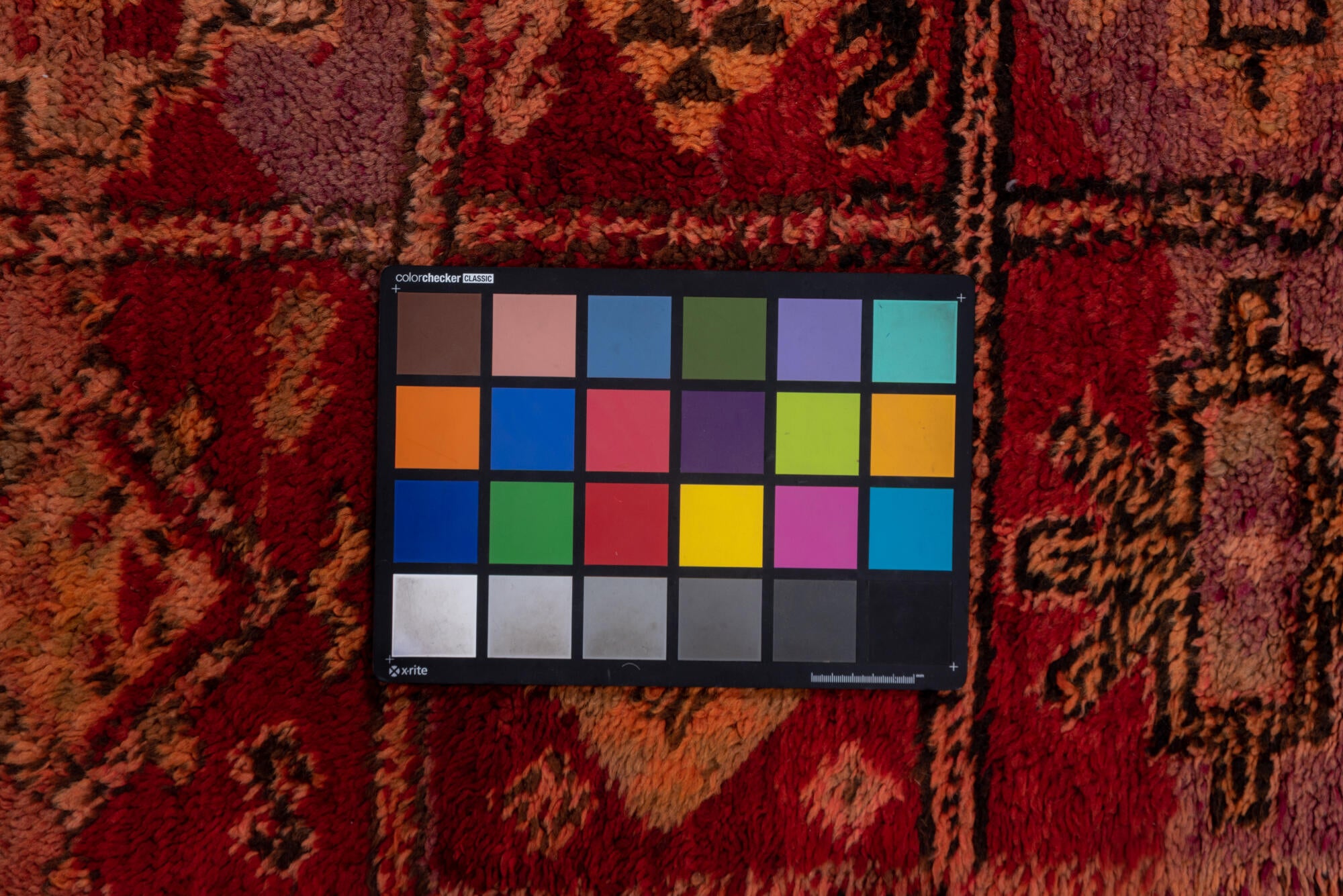 5' x 9' one-of-a-kind handmade vintage Moroccan medium size rug. Color palette: brown, gray, light gray, off-white, pink