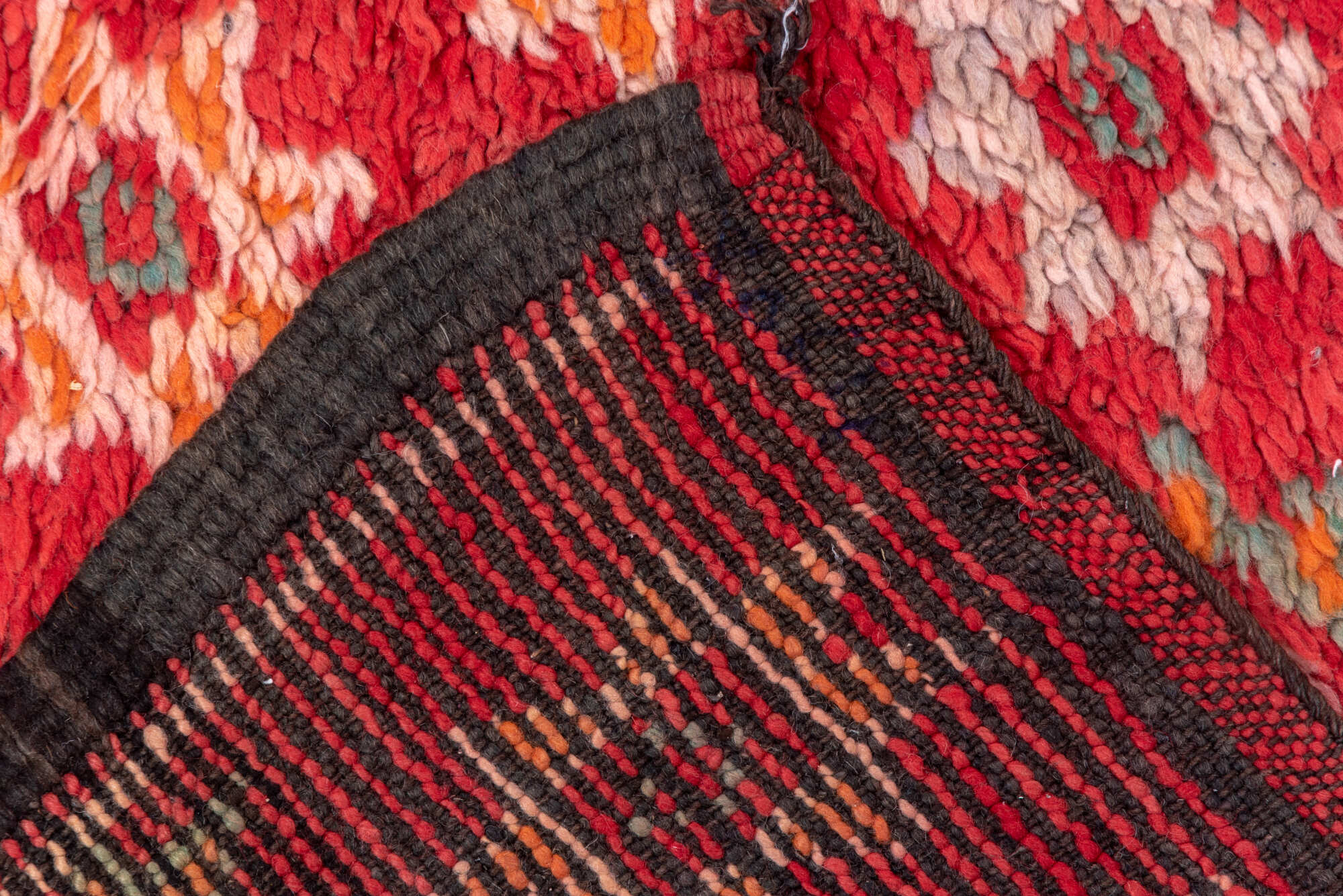 6' x 9' one-of-a-kind handmade vintage Moroccan medium size rug. Color palette: brown, burgundy, indian red, pink, red