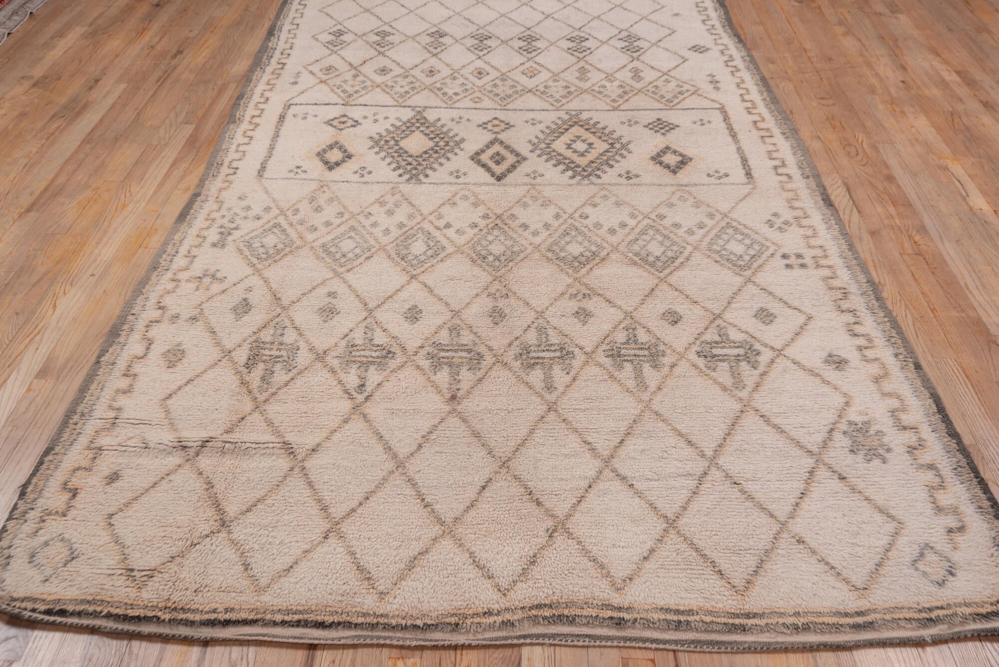 6' x 11' one-of-a-kind handmade vintage Moroccan large size rug. Color palette: brown, gray, light gray, off-white, orange