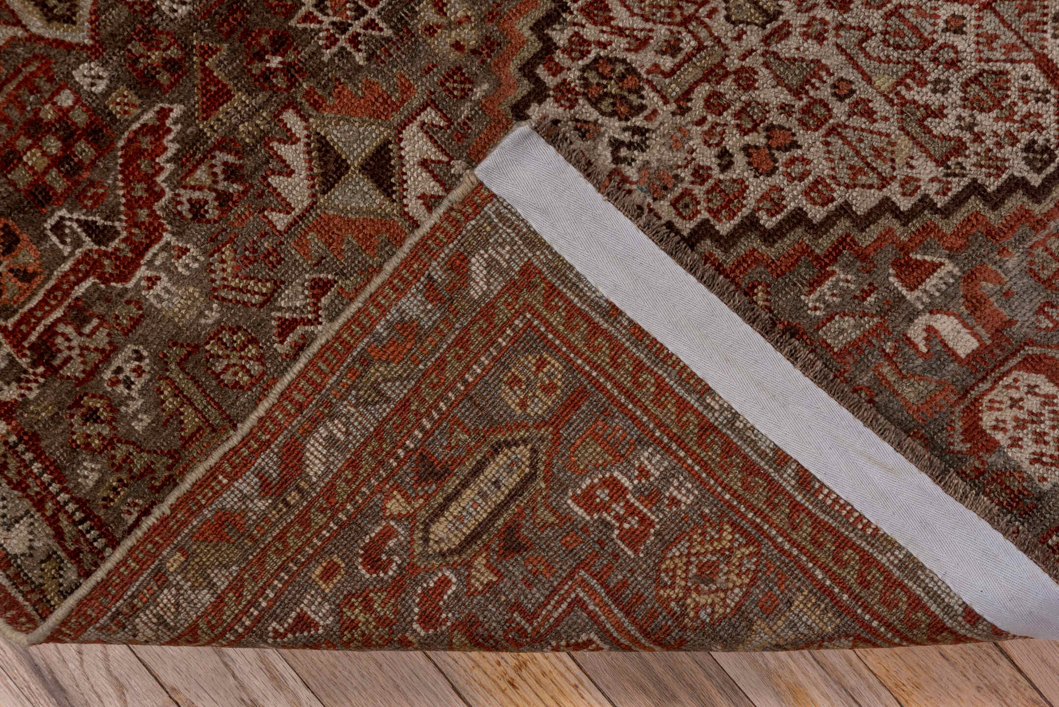 4' x 5' one-of-a-kind handmade vintage Shiraz small size rug. Color palette: gray, pink, brown