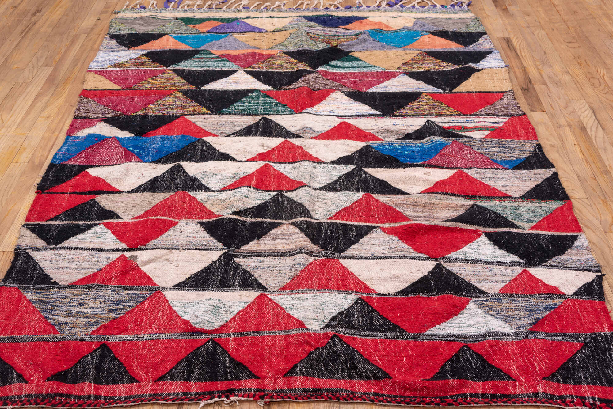 5' x 8' one-of-a-kind handmade vintage Rag Rug medium size rug. Color palette: black, blue, brown, charcoal, dim gray, gray