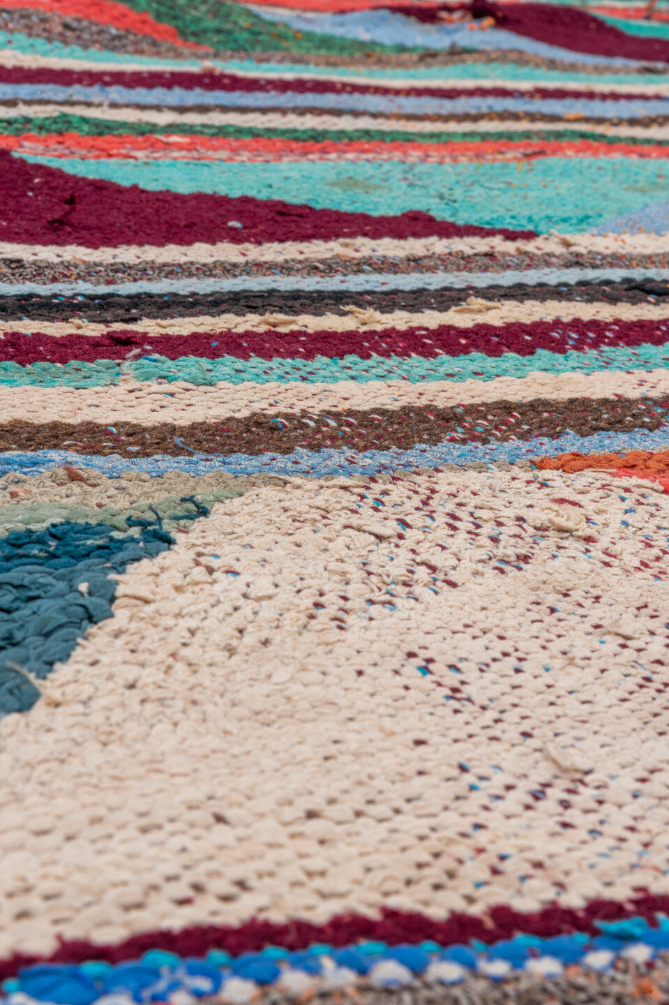 4' x 5' one-of-a-kind handmade vintage Rag Rug small size rug. Color palette: gray, blue, off-white, light blue, green, pink