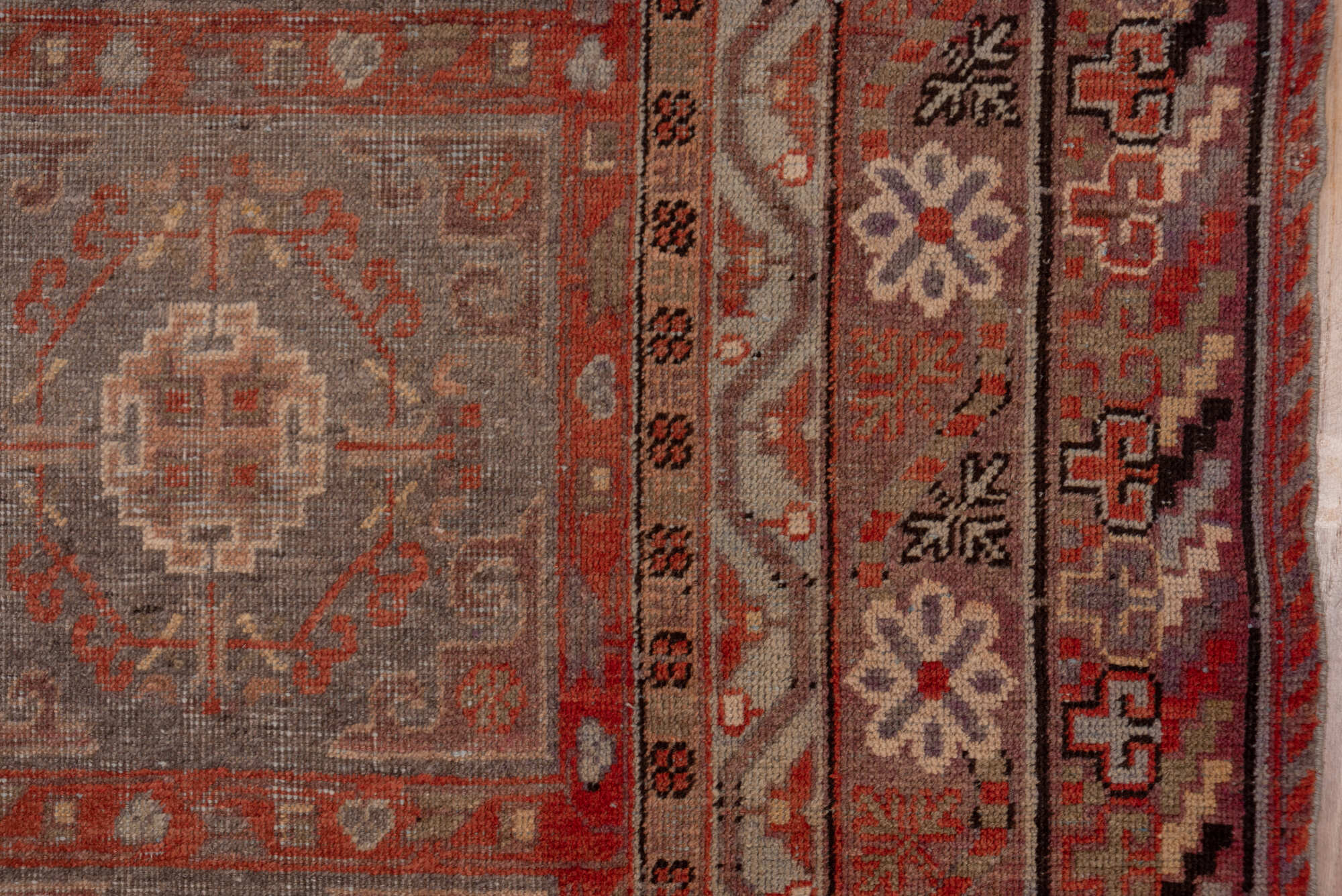 6' x 12' one-of-a-kind handmade vintage Khotan large size rug. Color palette: red, brown, pink, gray